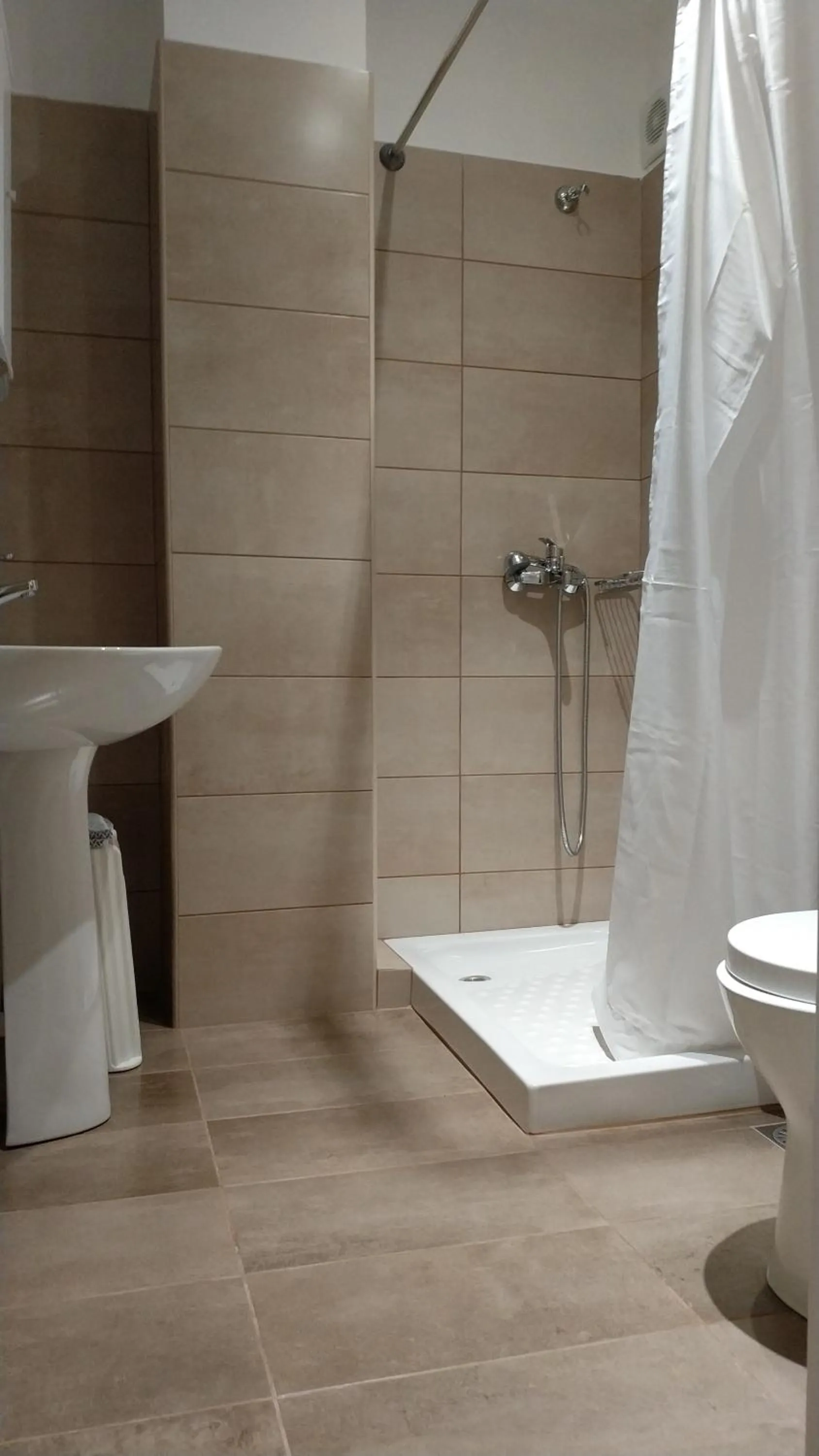 Shower in Ambrosia Suites