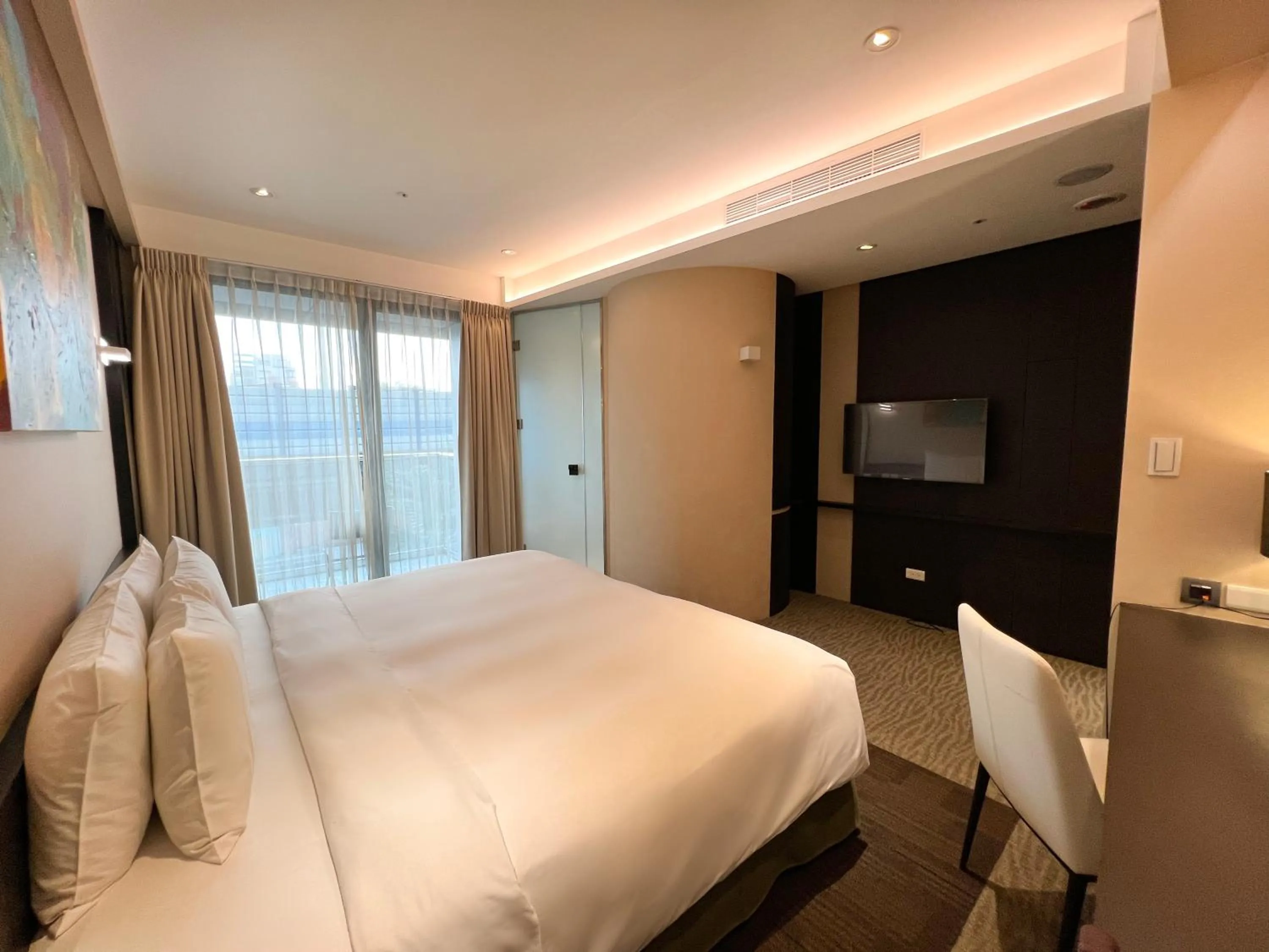 Bedroom in Wallsun Hotel