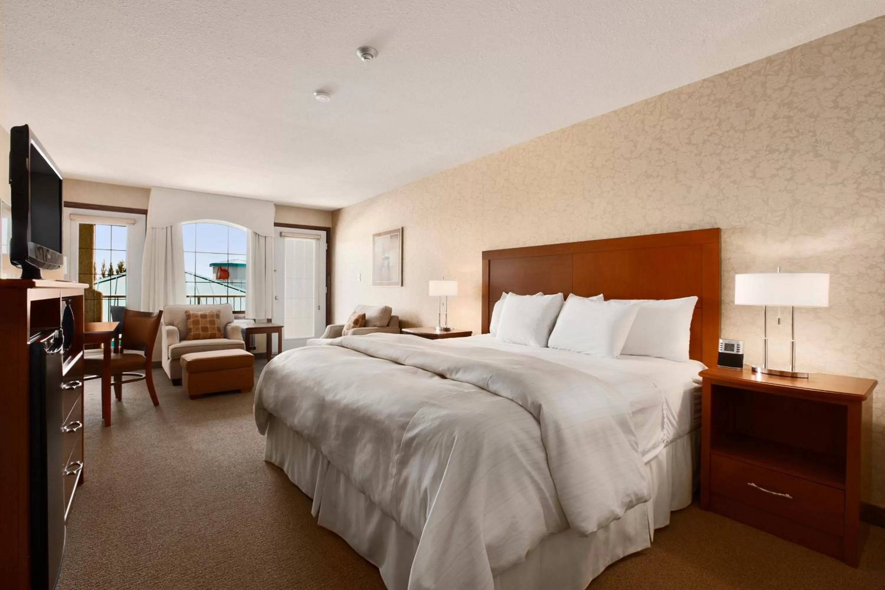 Bed in Days Inn & Suites by Wyndham Brandon