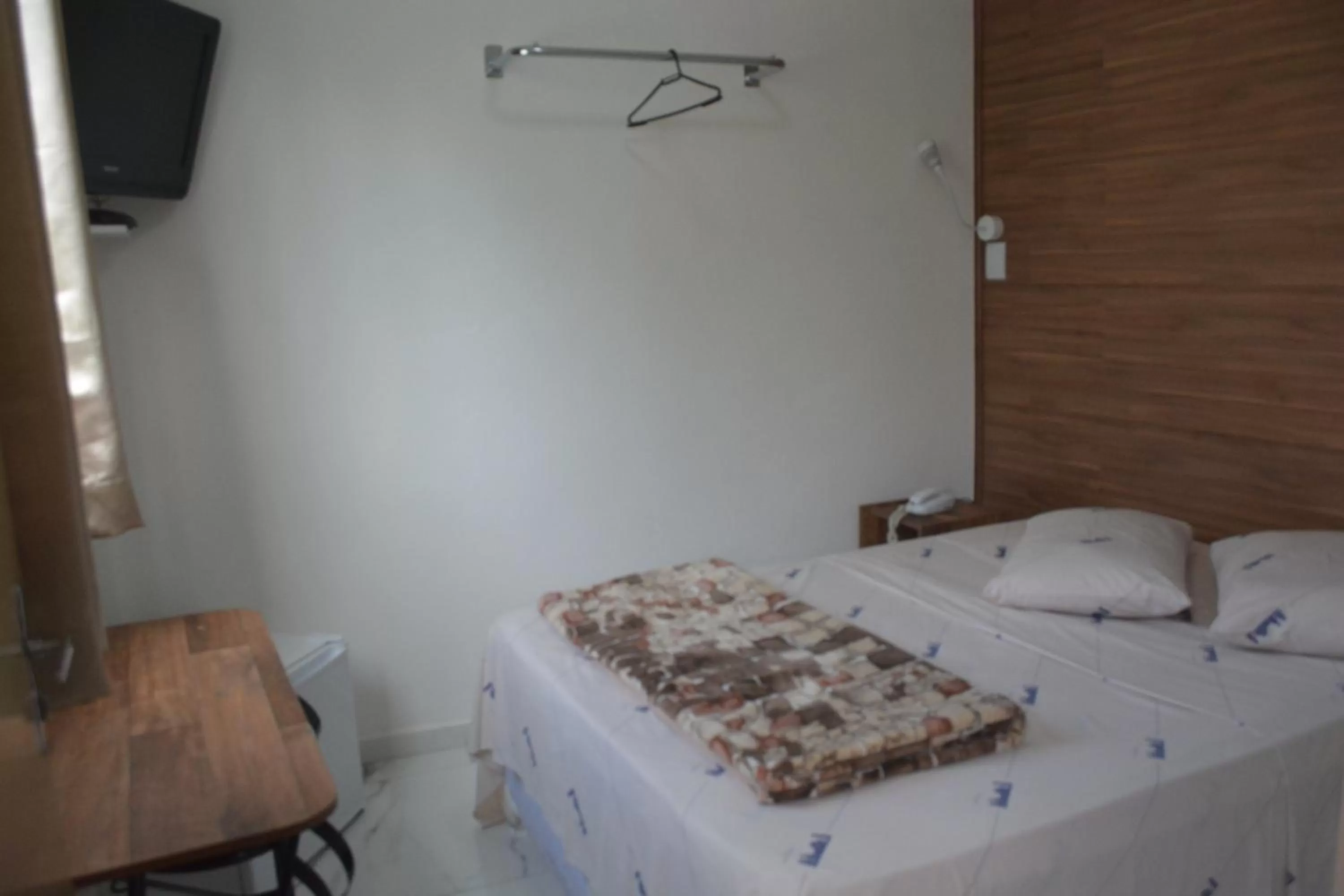 Bed in New Point Hotel