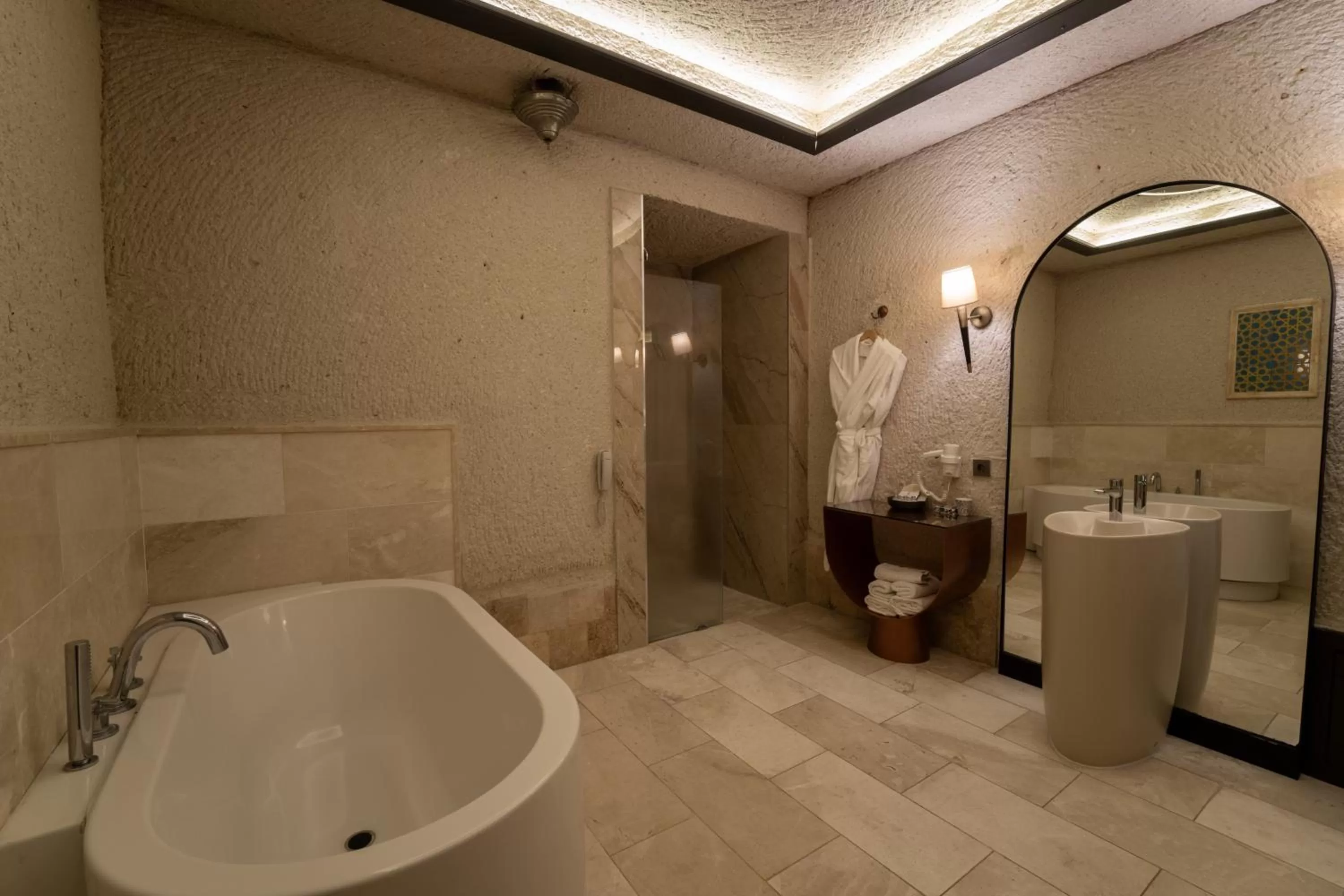 Bathroom in Artemis Cave Suites & Spa- Adults Only