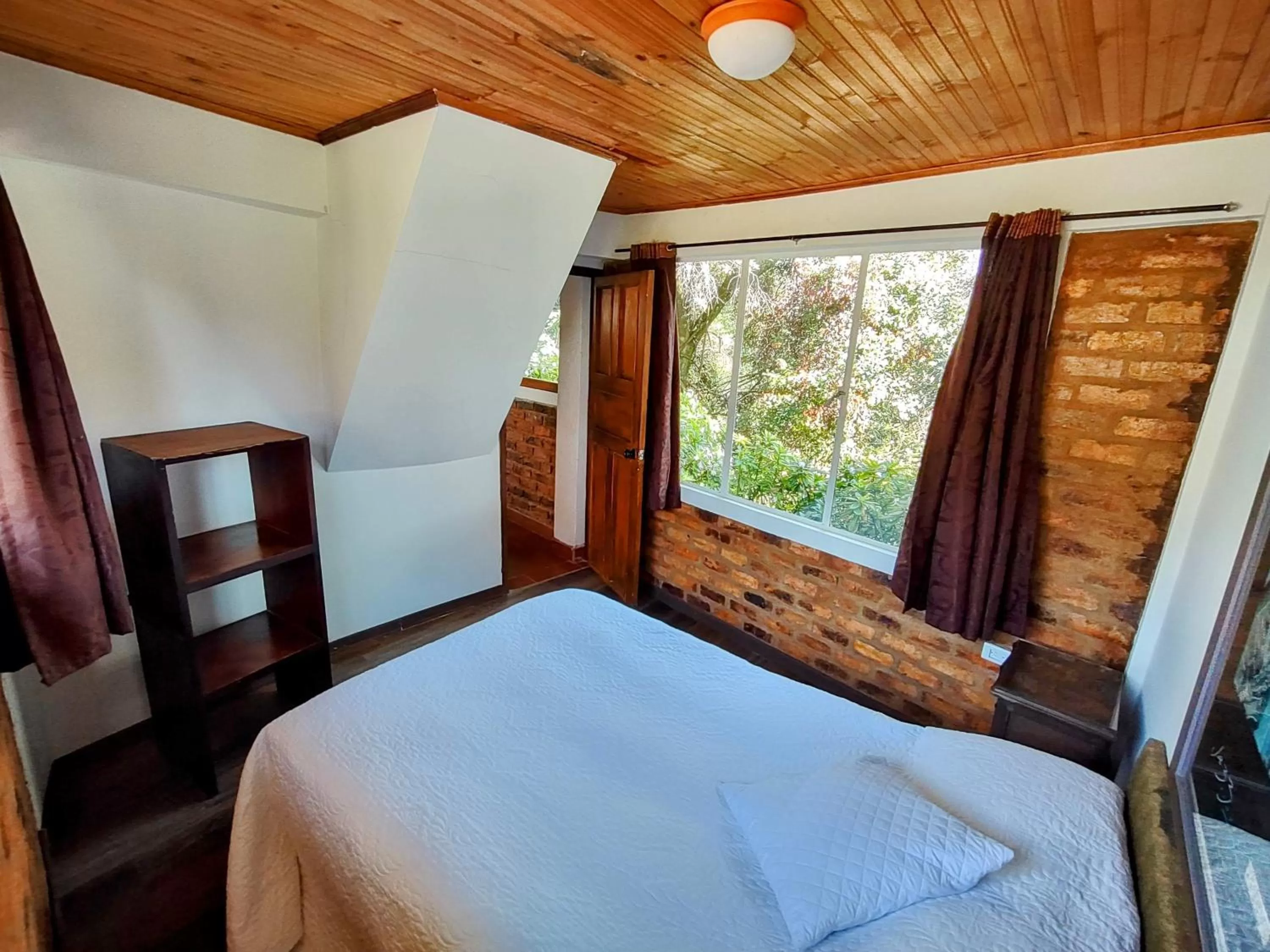 Bedroom, Bed in Refugio Génesis habitaciones Lago de Tota