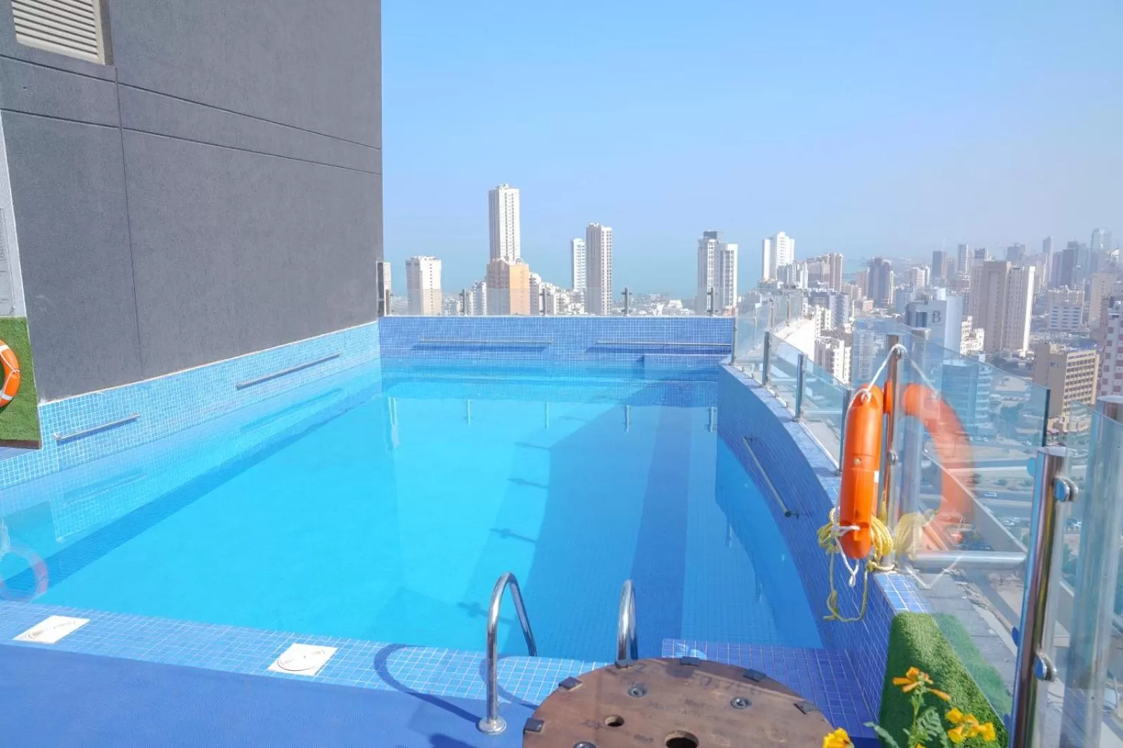 Swimming pool in Ramada Encore by Wyndham Kuwait Downtown