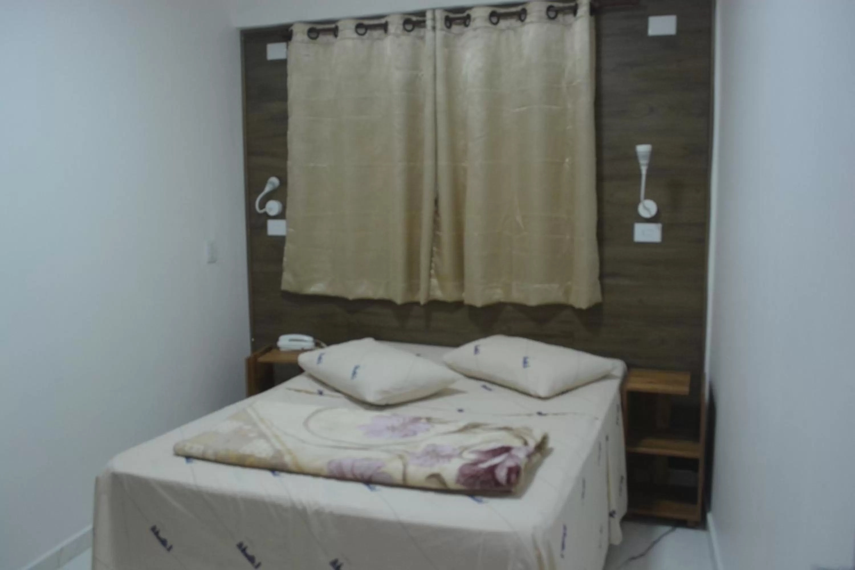 Bed in New Point Hotel