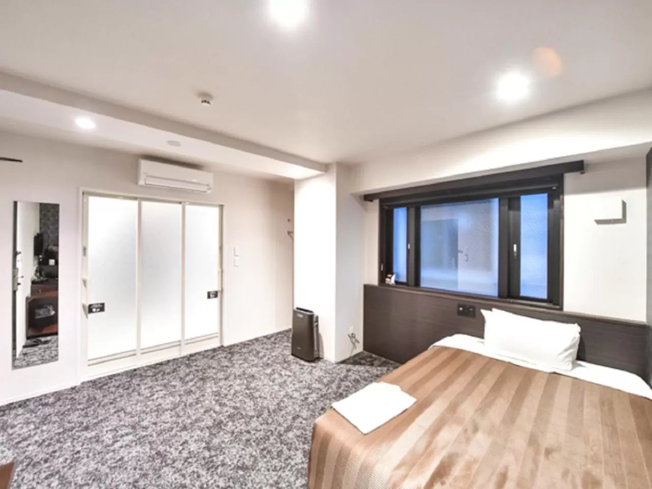 Photo of the whole room, Bed in HOTEL LiVEMAX Hakataekimae