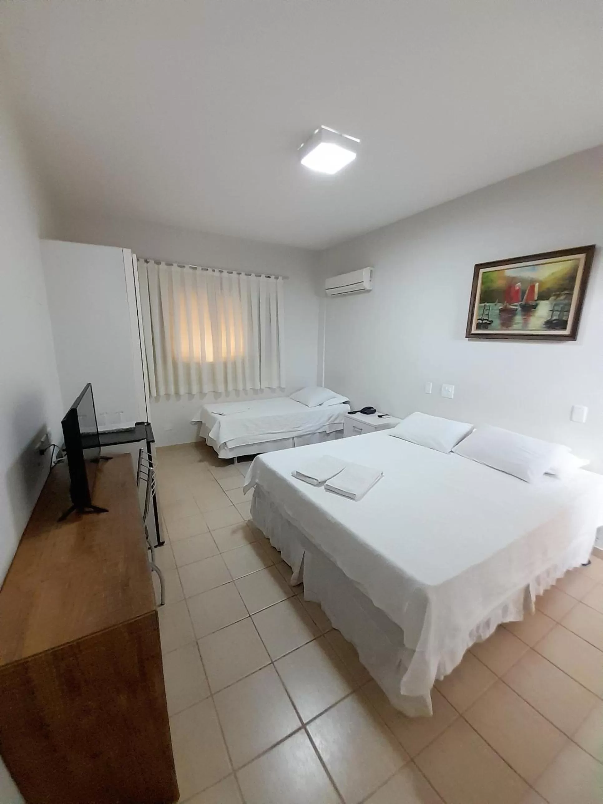 Bed in Jales Center Hotel