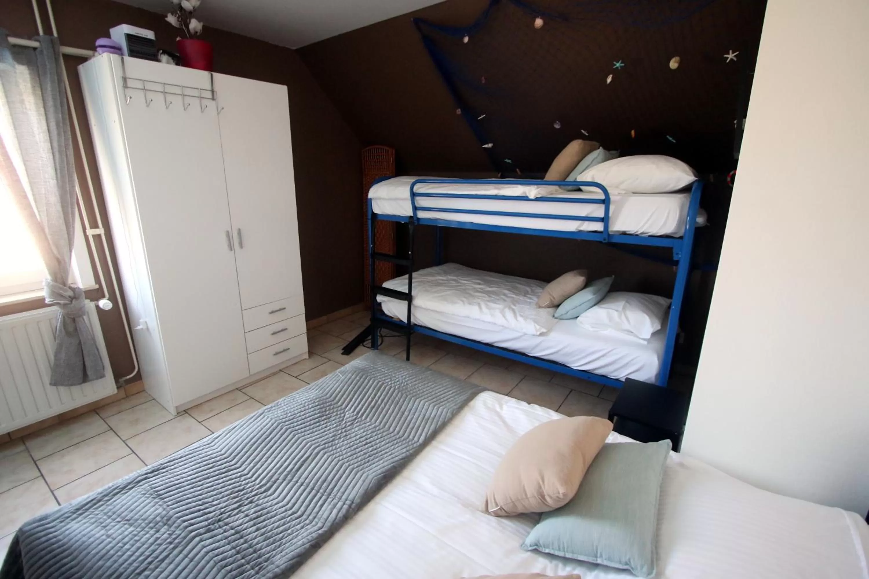 Bed in Chambre d'hôte Blankenberge