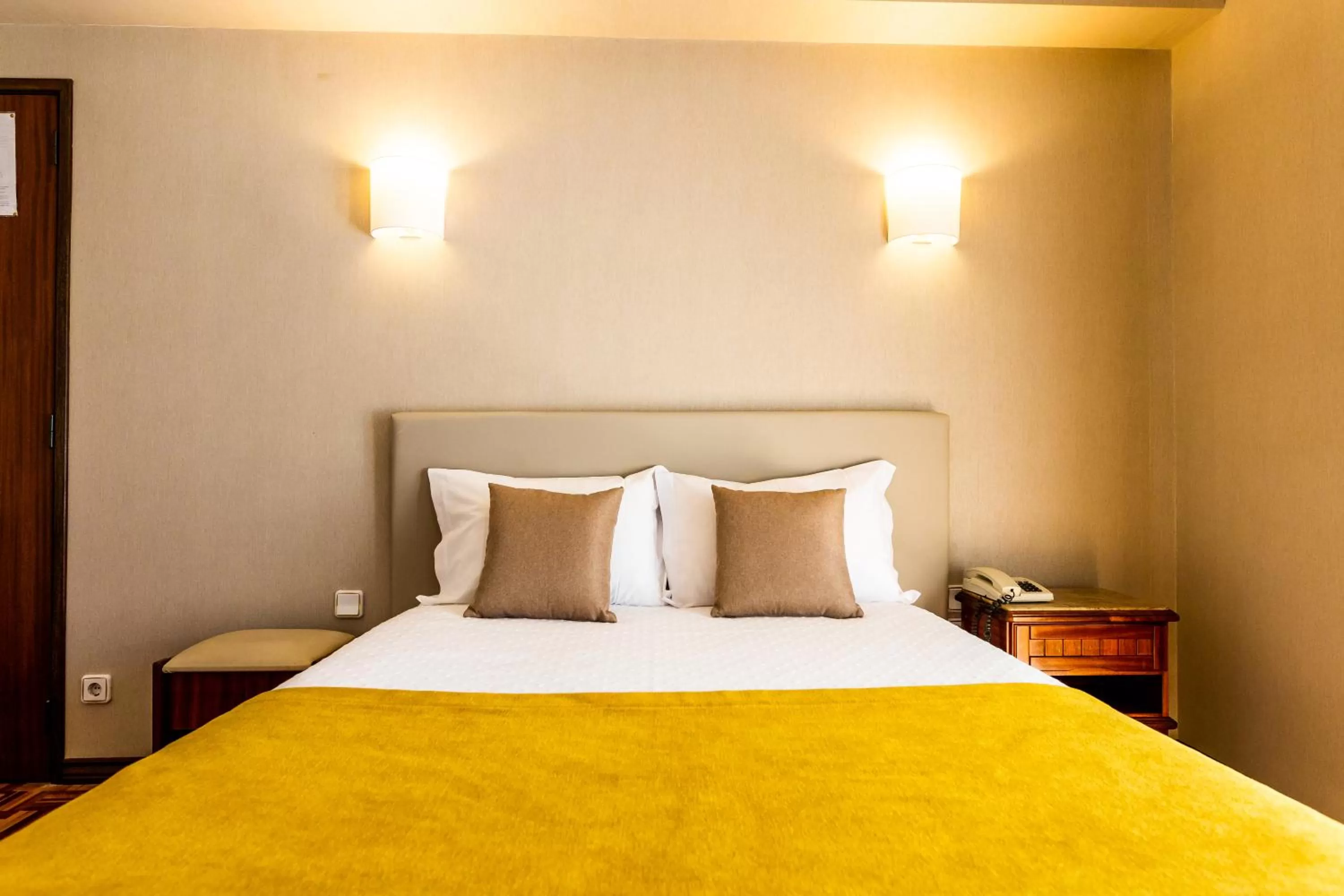 Bed in Dona Amélia Hotel by RIDAN Hotels