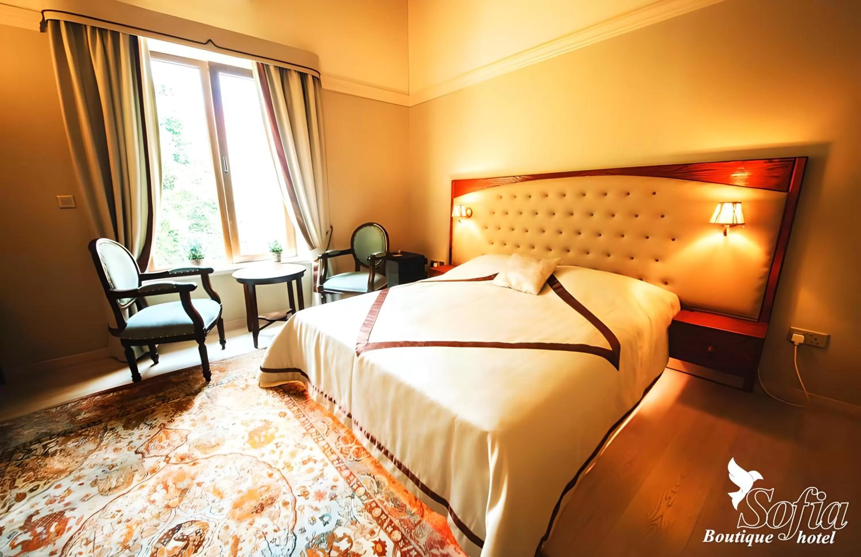 Bed in SOFIA BOUTIQUE HOTEL