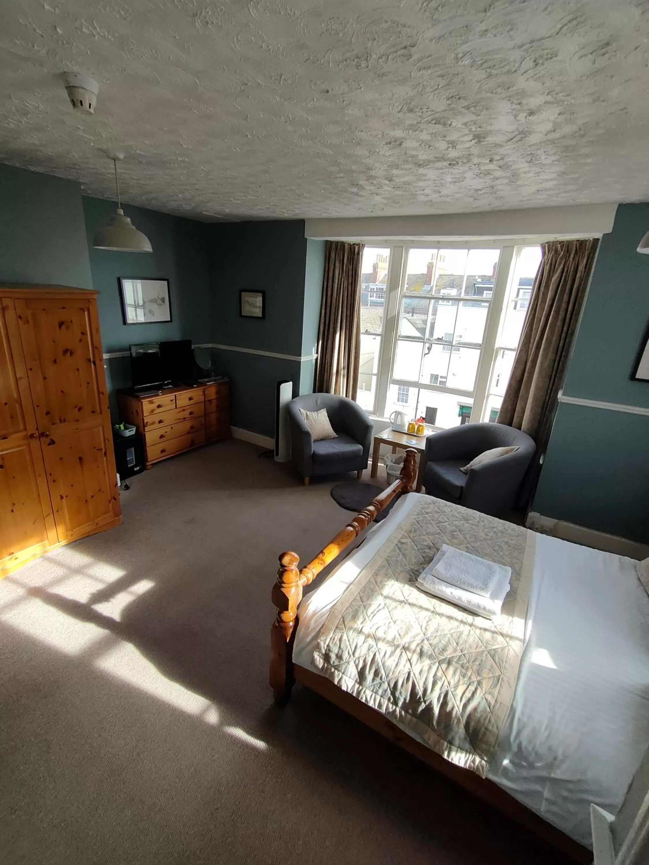 Bed in Valentine Guest House