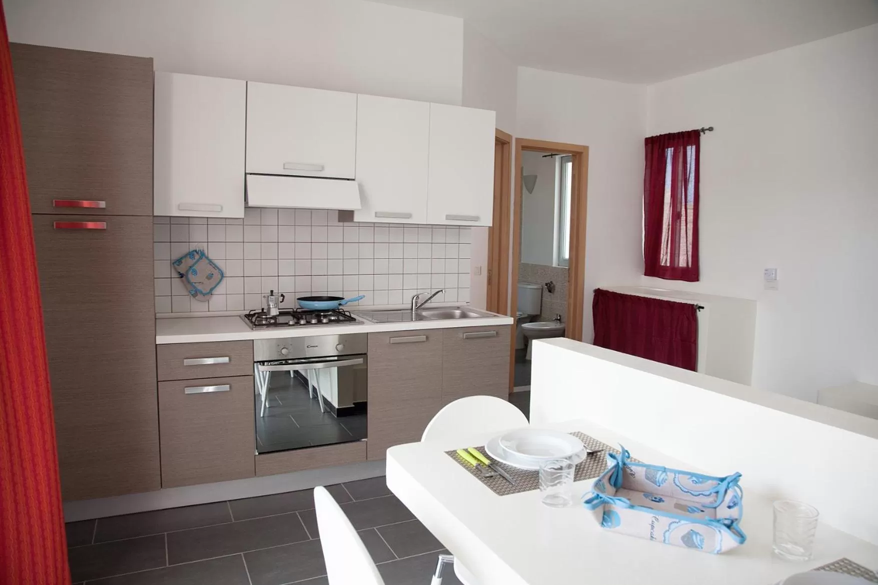 Kitchen or kitchenette in Cala da Lua apartments