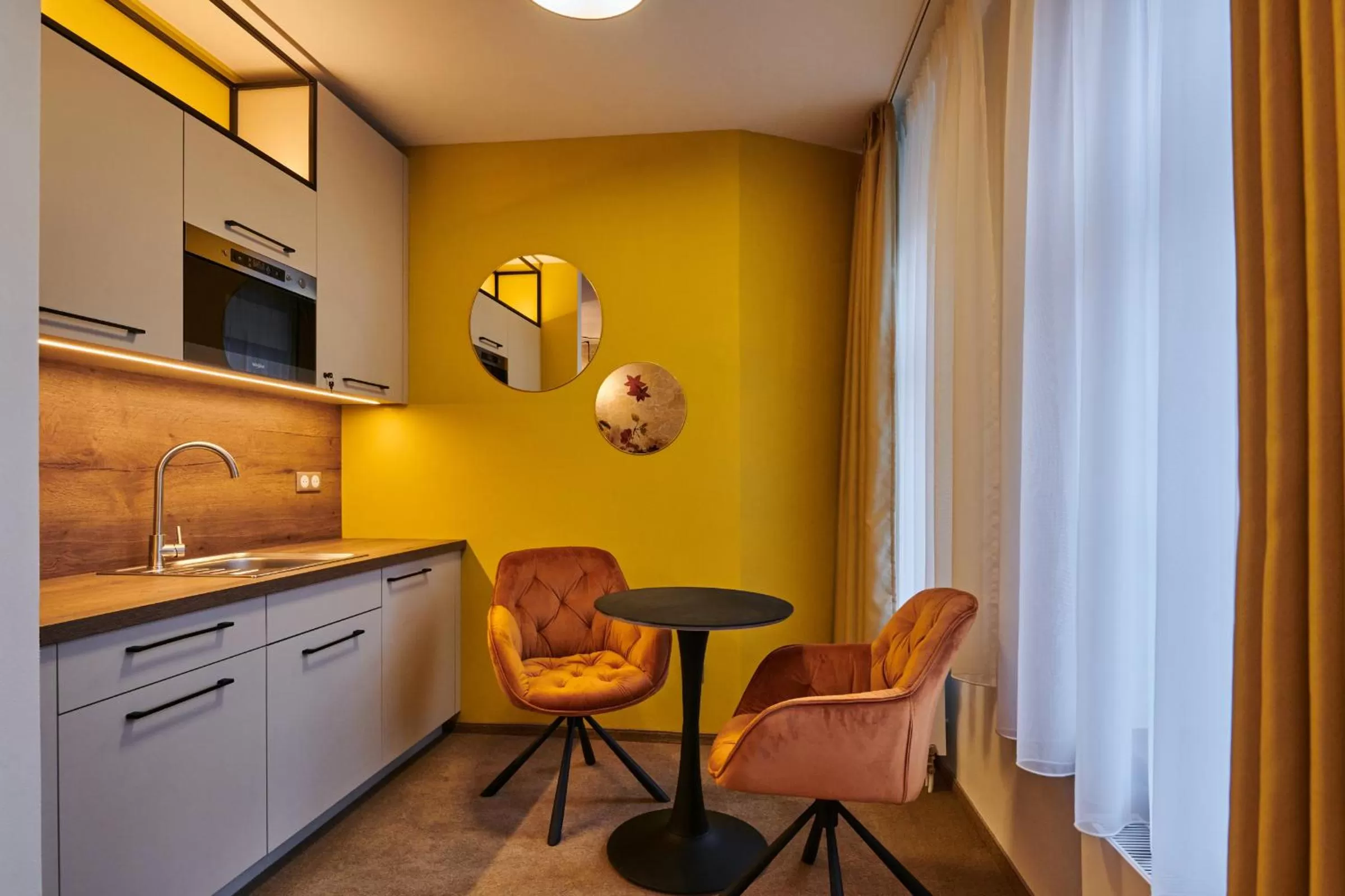 Kitchen or kitchenette in Hotel Alfréd a Hermína