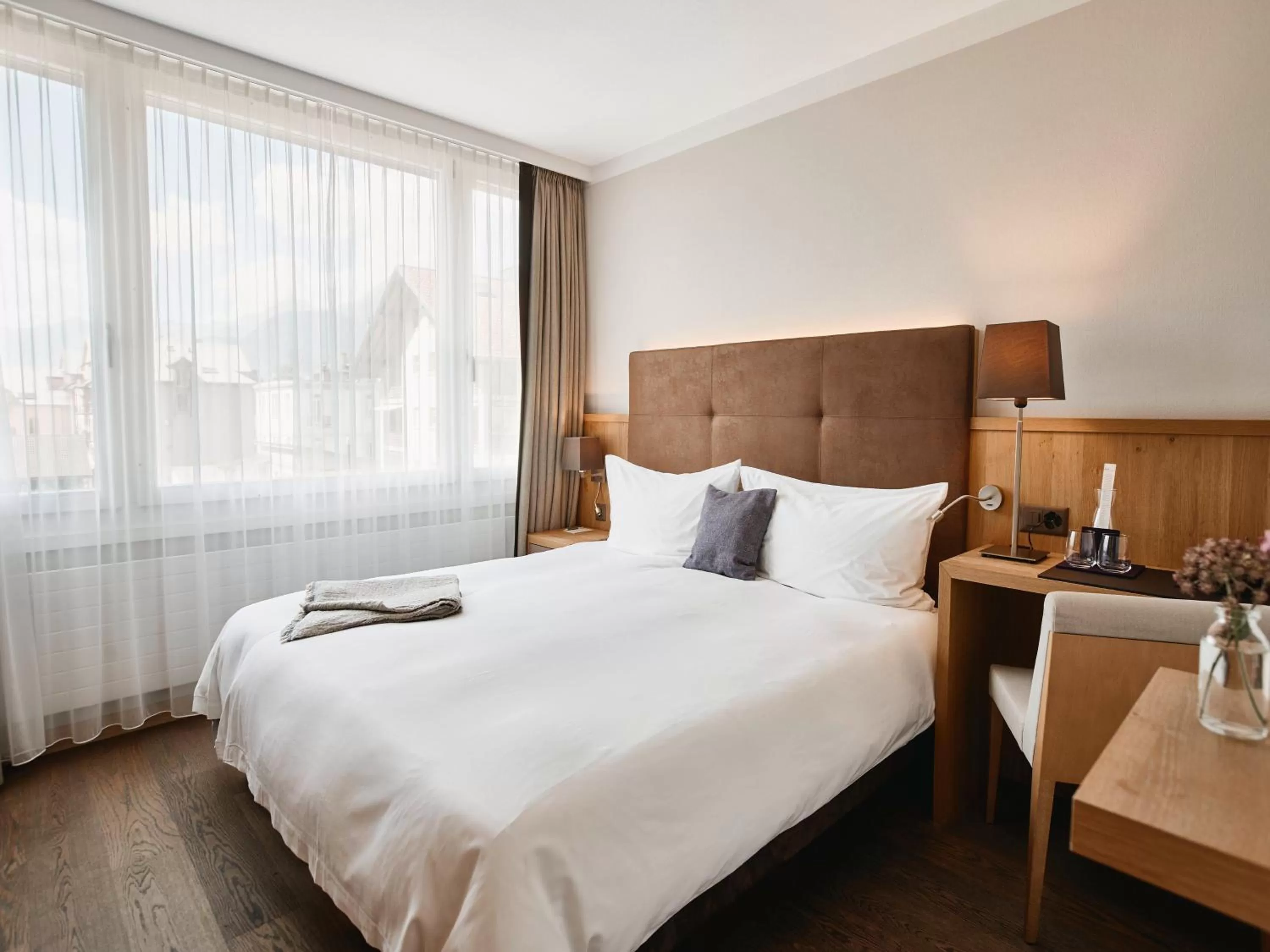 Bed in Victoria - Alpine Boutique Hotel & Fine Dining