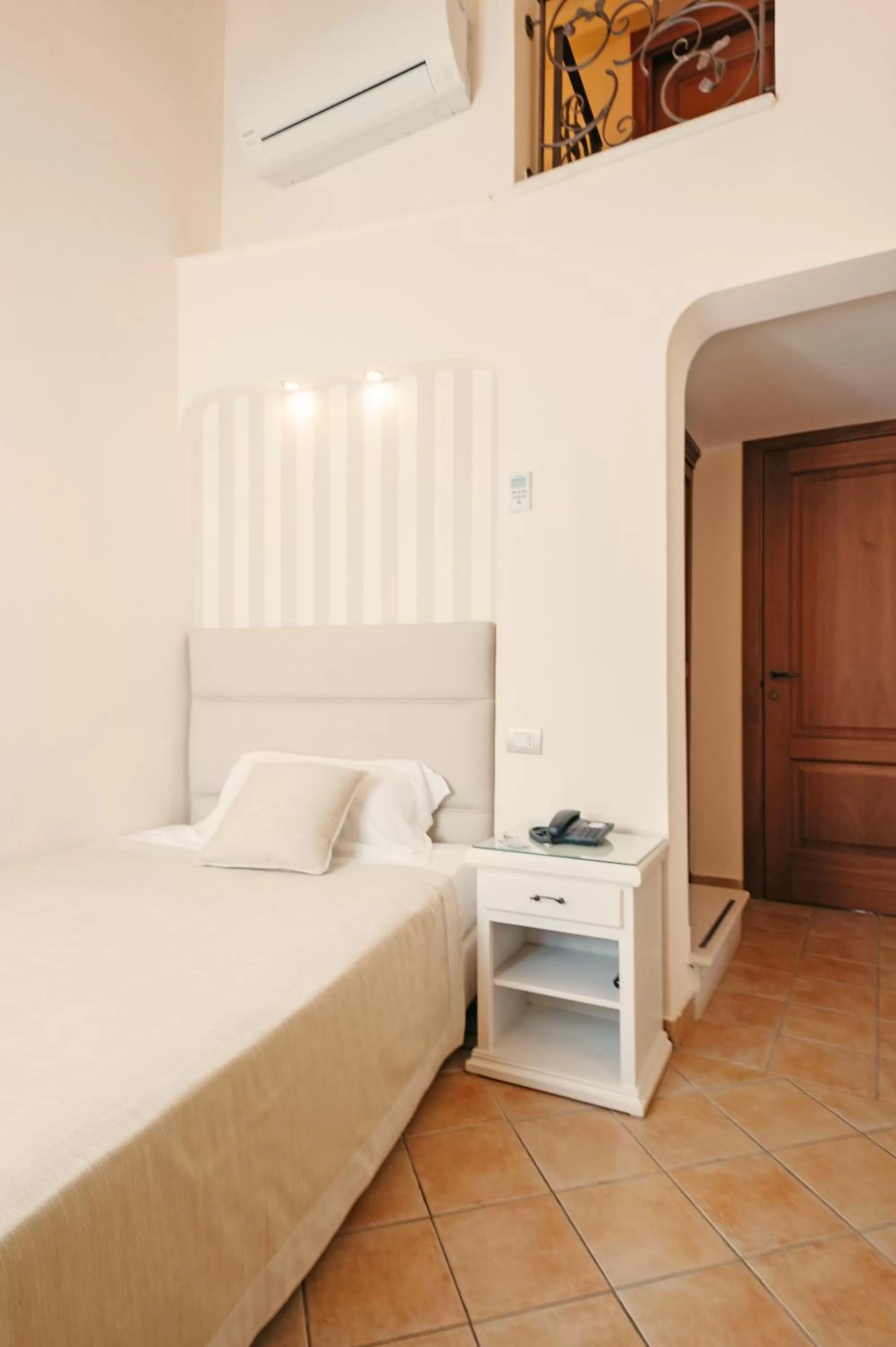 Bed in Hotel L'Arcangelo - Boutique Hotel