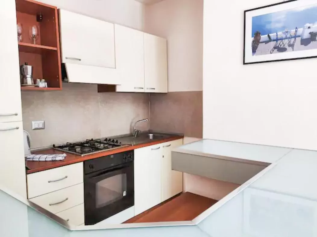 Kitchen or kitchenette in Villa delle Palme