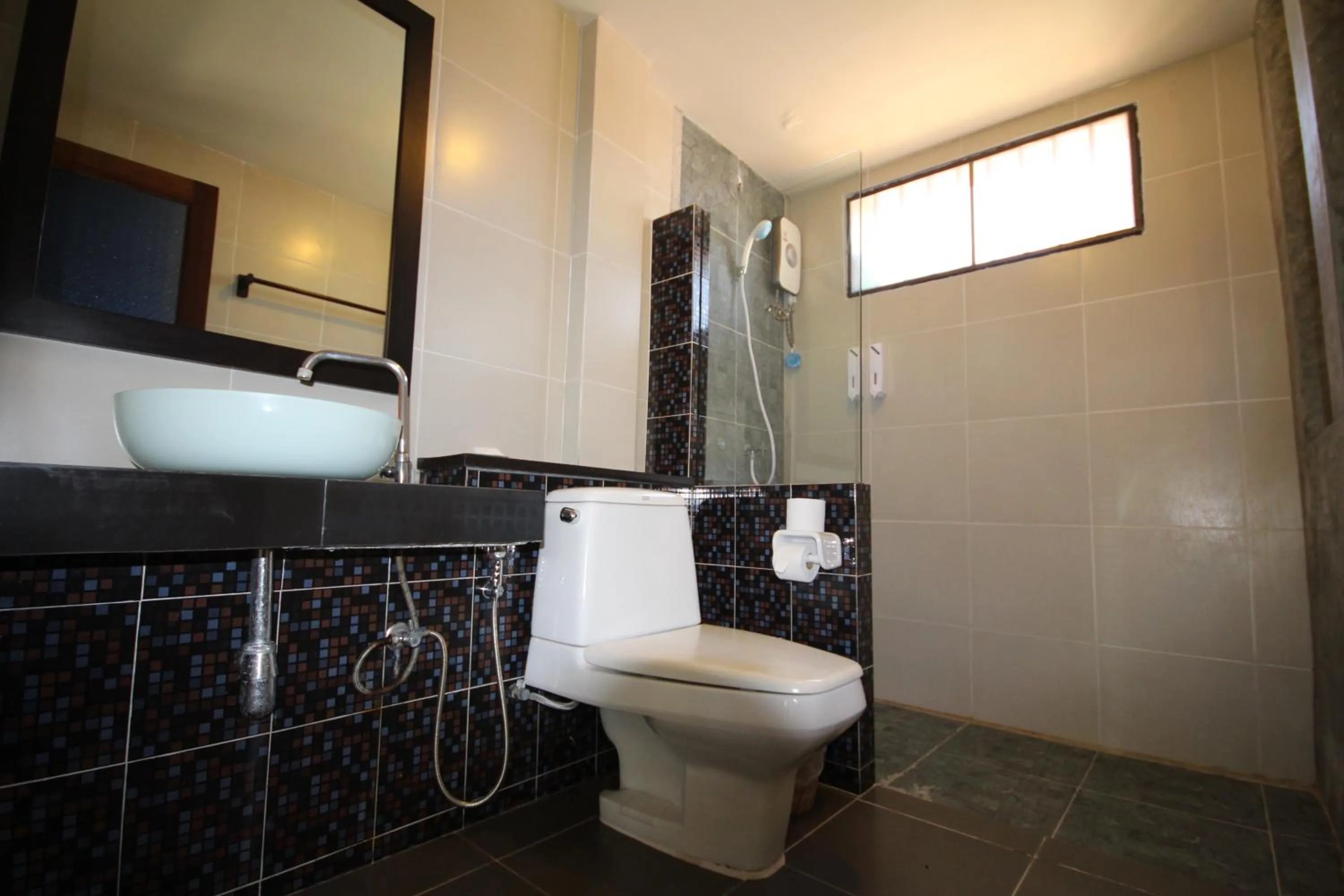 Bathroom in Coco Lanta Resort - SHA Extra Plus