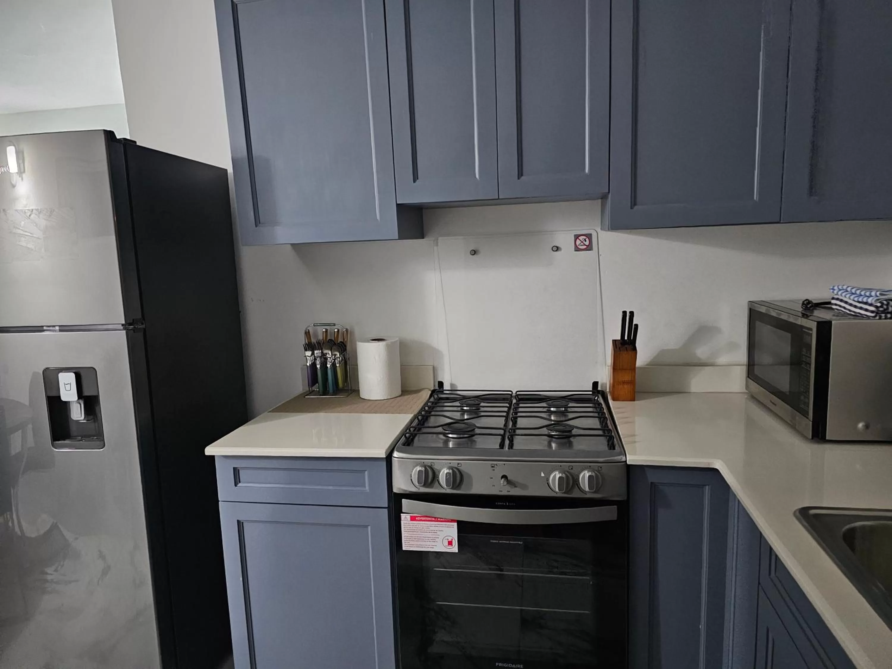 Kitchen or kitchenette in Roots Cafe Rooms