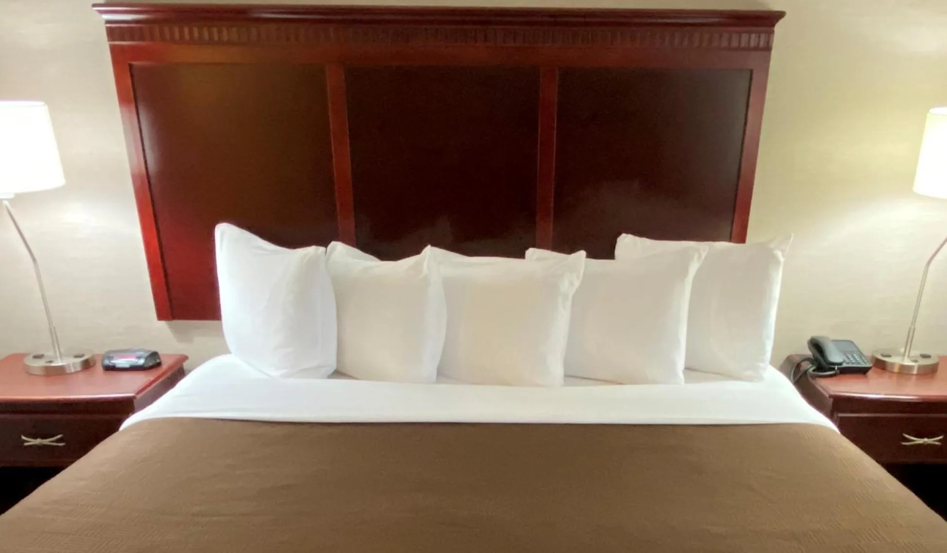 Bed in Clarion Inn & Suites Grand Rapids Airport