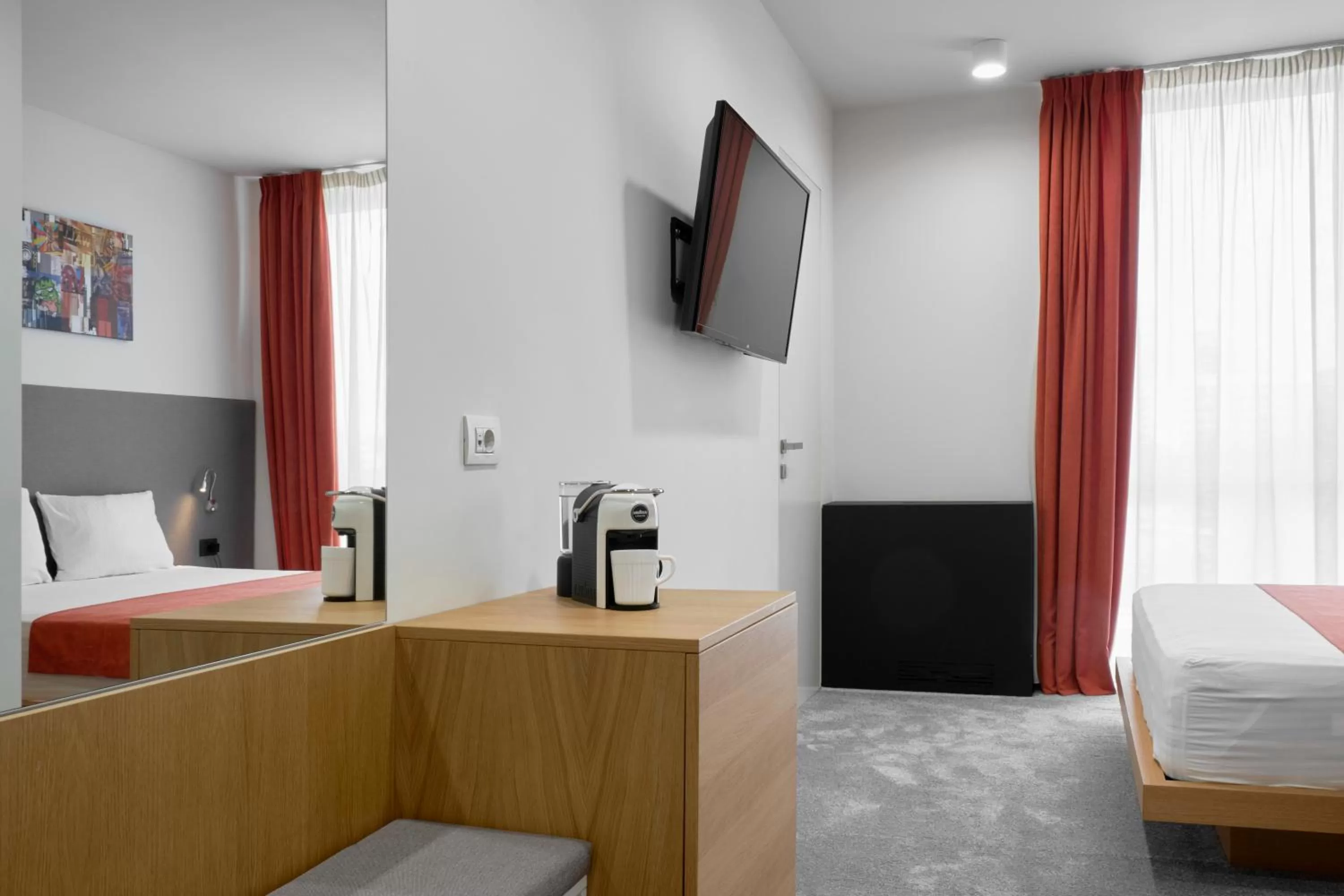 TV and multimedia, TV/Entertainment Center in Adella Boutique Hotel - Free Secured Parking