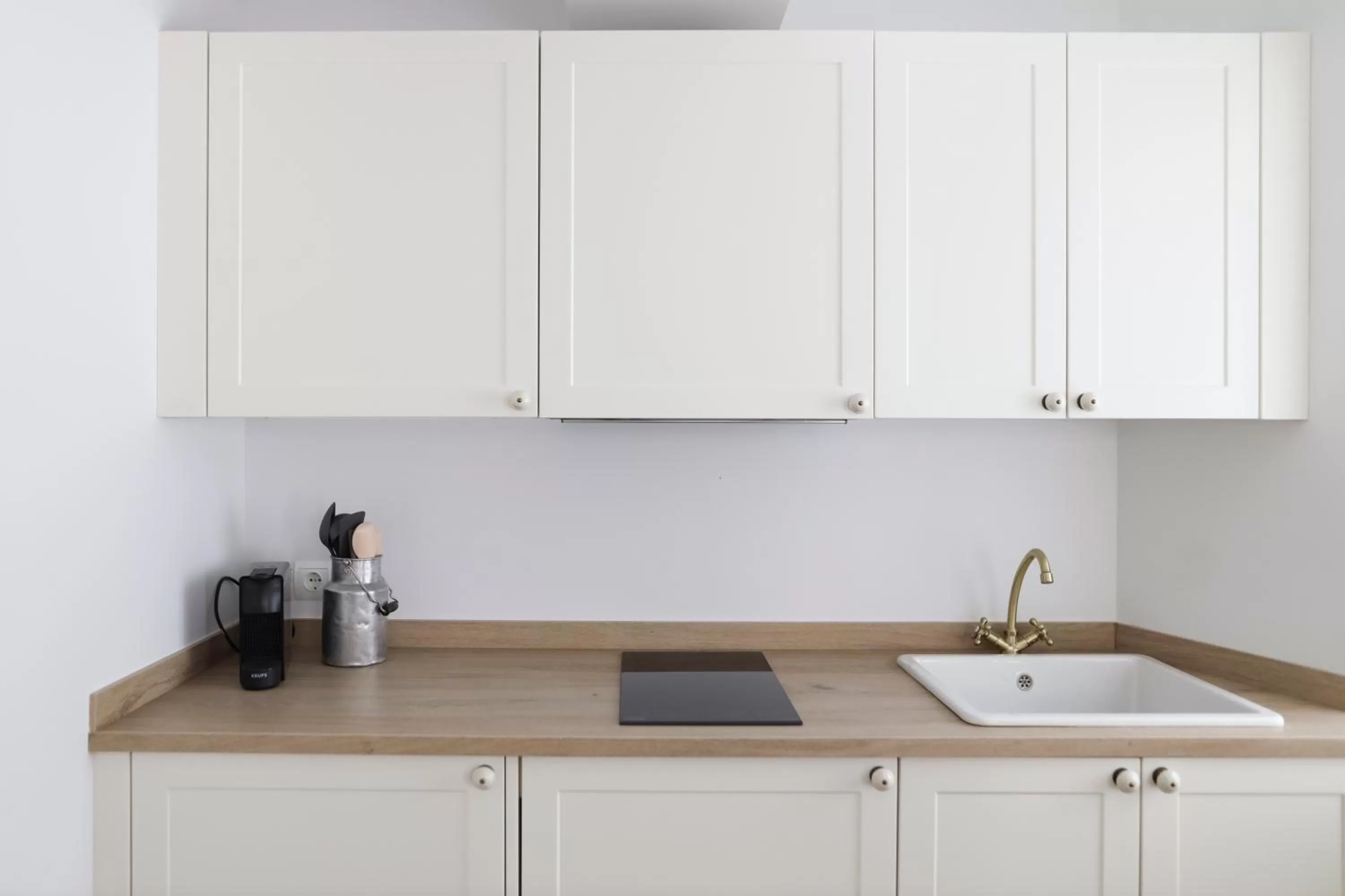 Kitchen or kitchenette in Le Petit Boutique Hotel