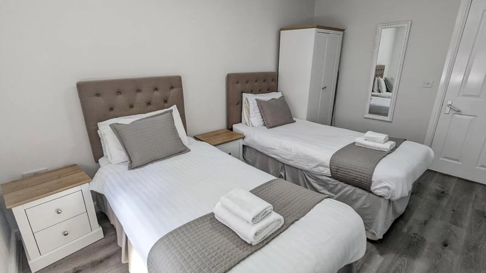 Bed in Cocoon @ International Inn + Apartments