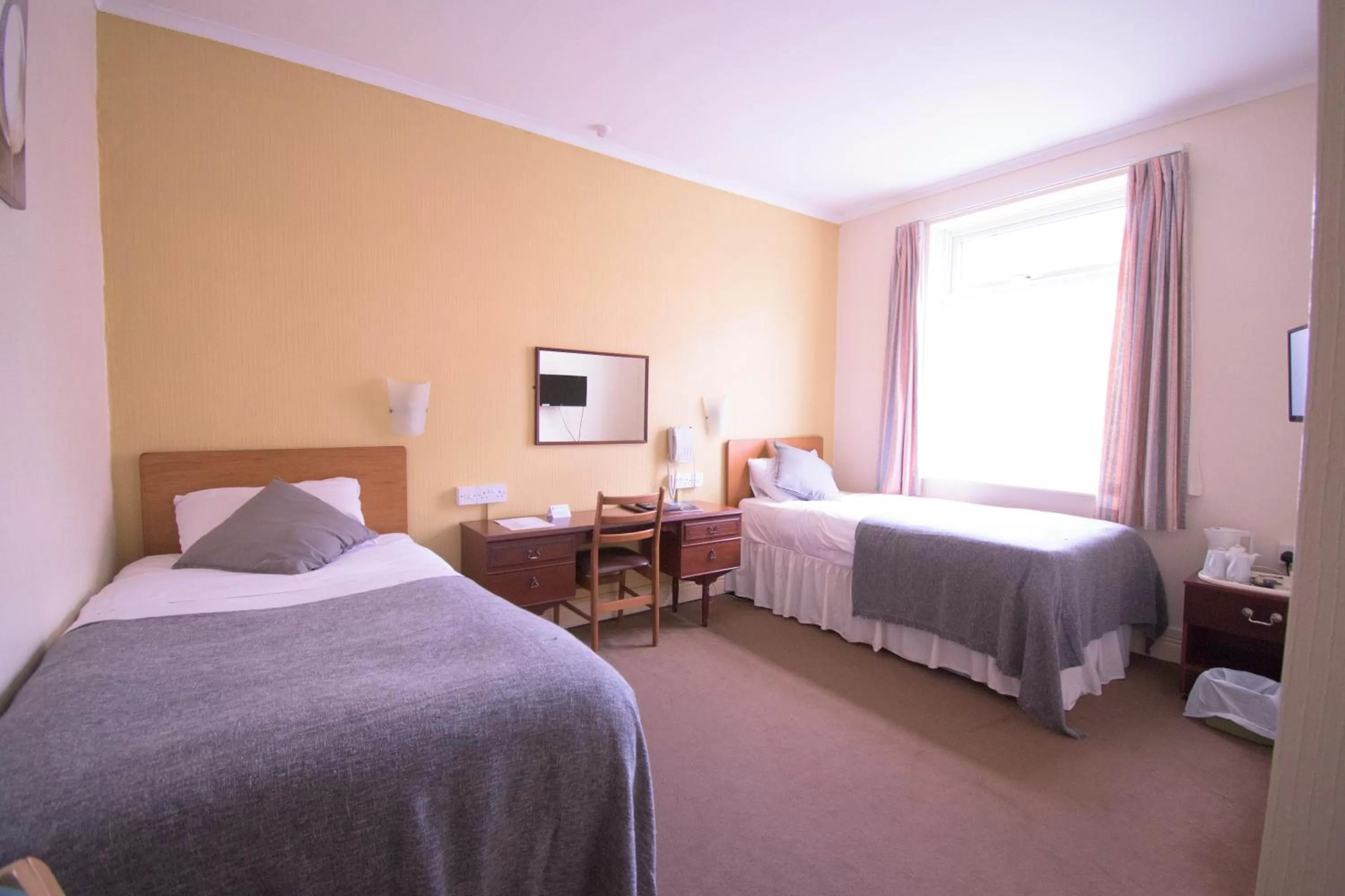 Bed in Pinegrove Hotel