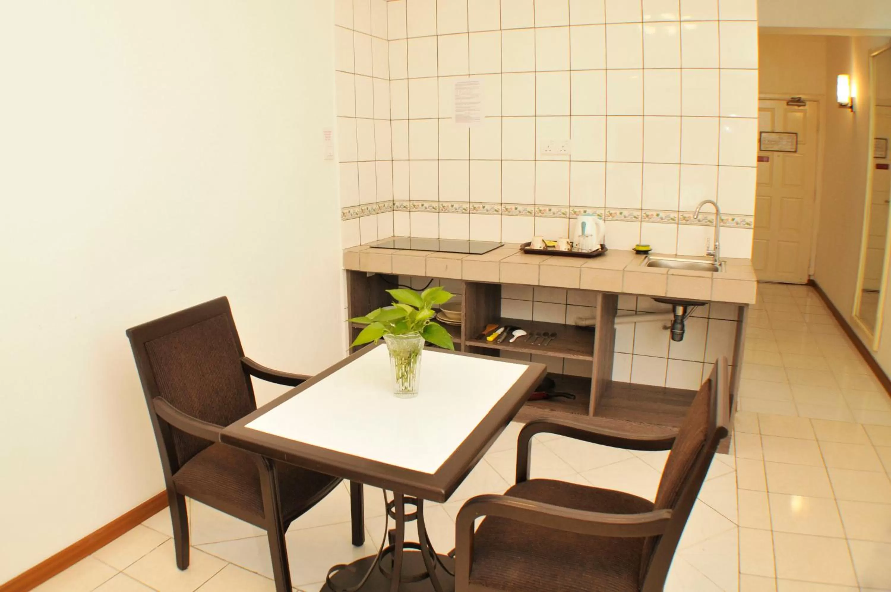 Dining area in Promenade Service Apartment