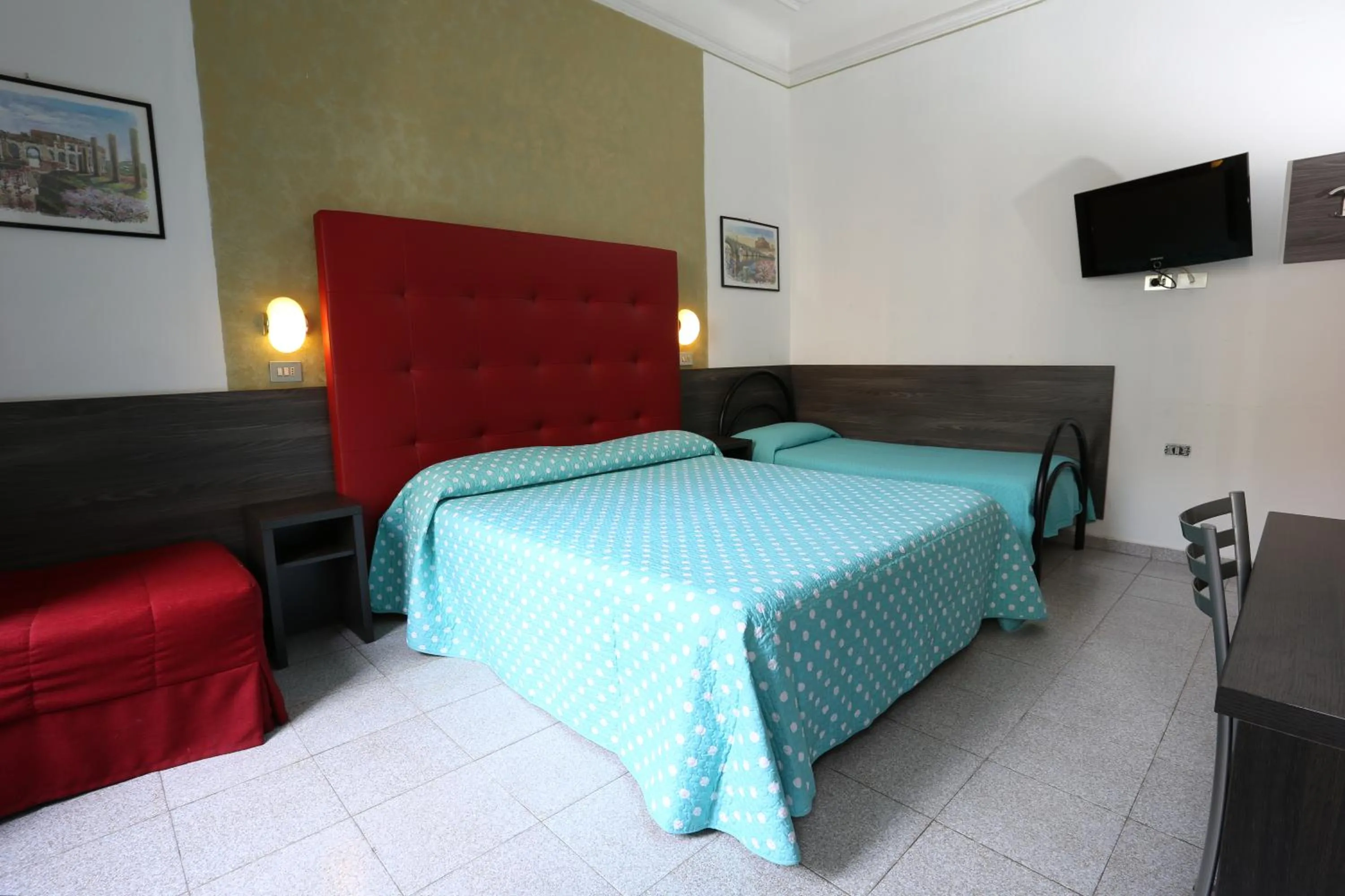 Bed in Hotel Piola