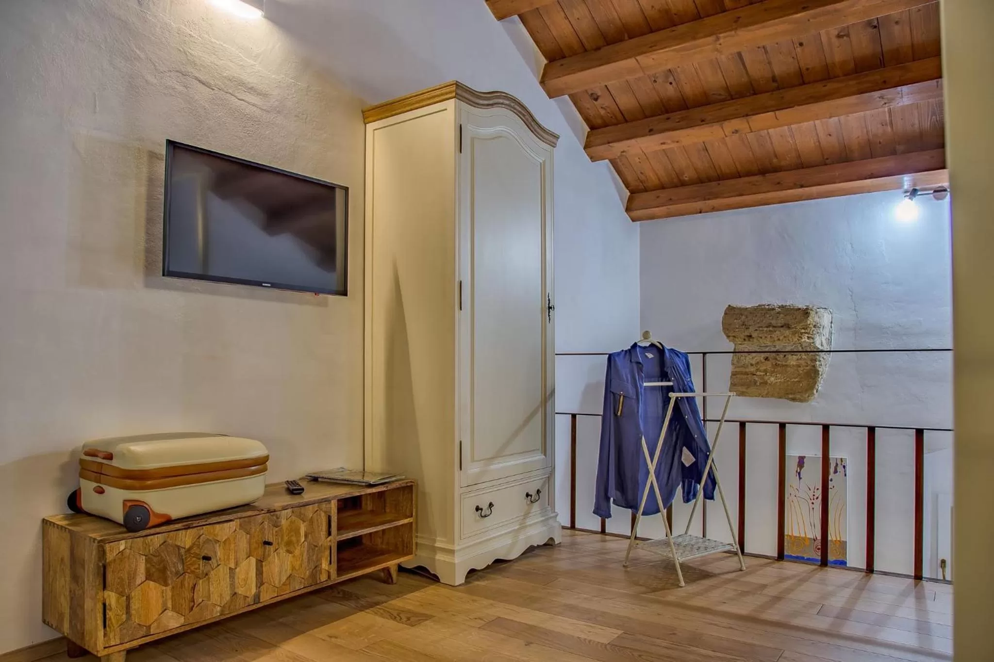 Bed in Le Maestranze Deluxe Rooms