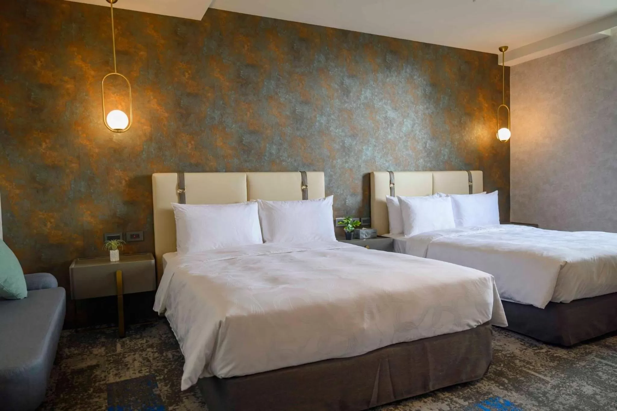 Bed in Tenz Go Hotel