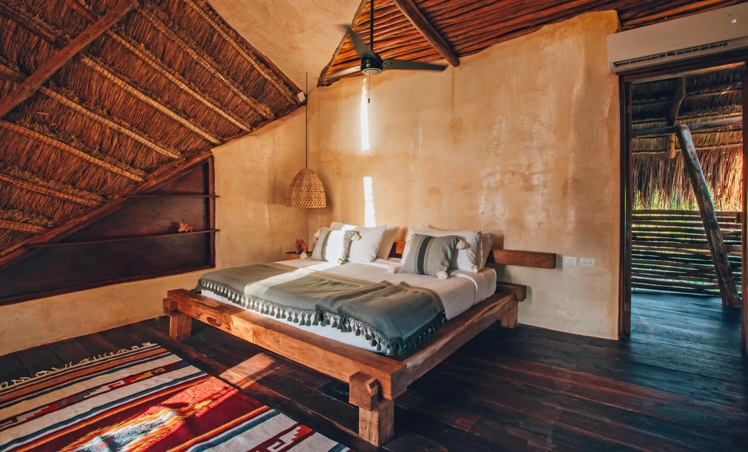 Photo of the whole room, Bed in Ikal Tulum Hotel