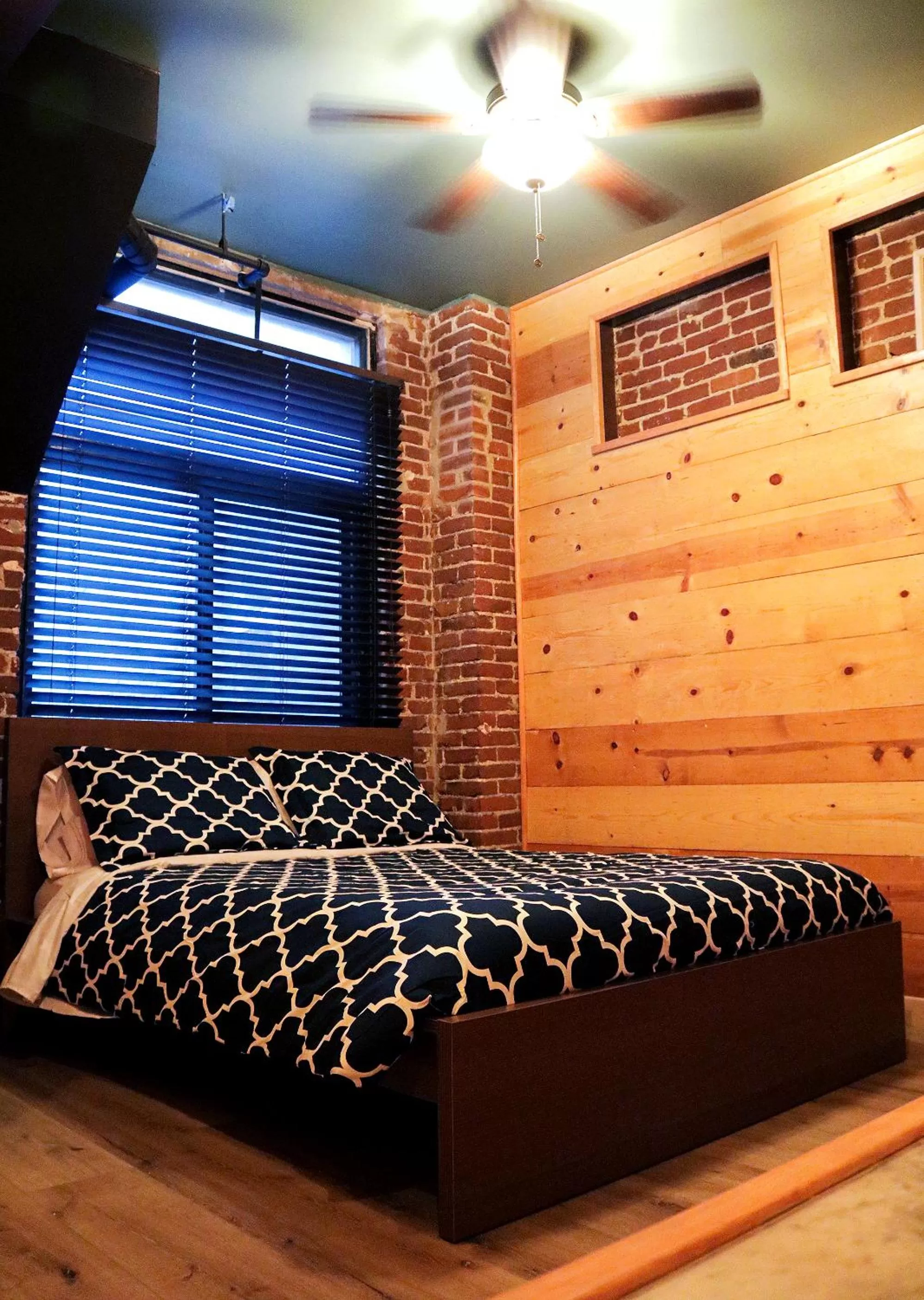 Bedroom, Seating Area in The Haas Suites