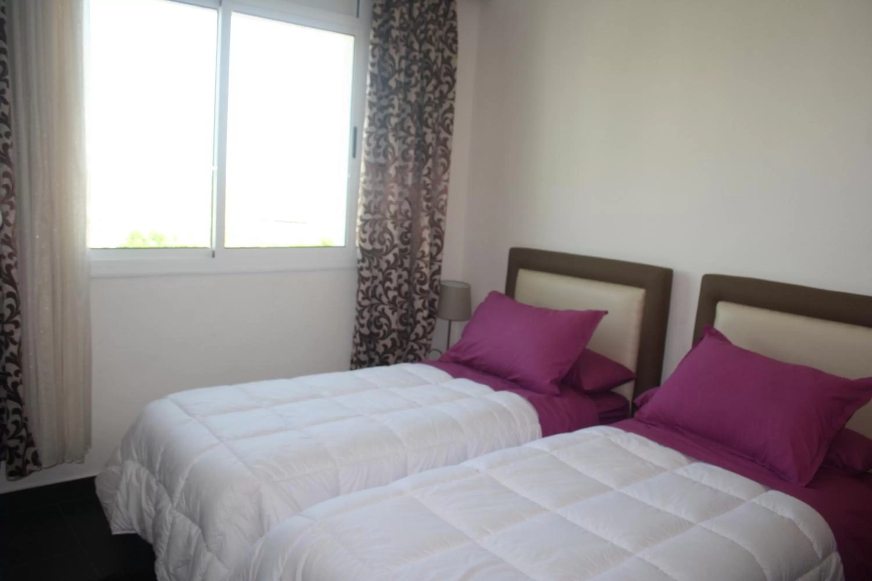 Bed in Hotel Salime Al Khozama