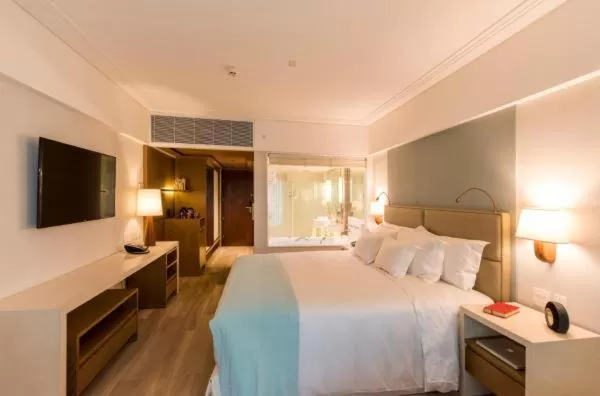 Bed in Vogal Luxury Beach Hotel & SPA