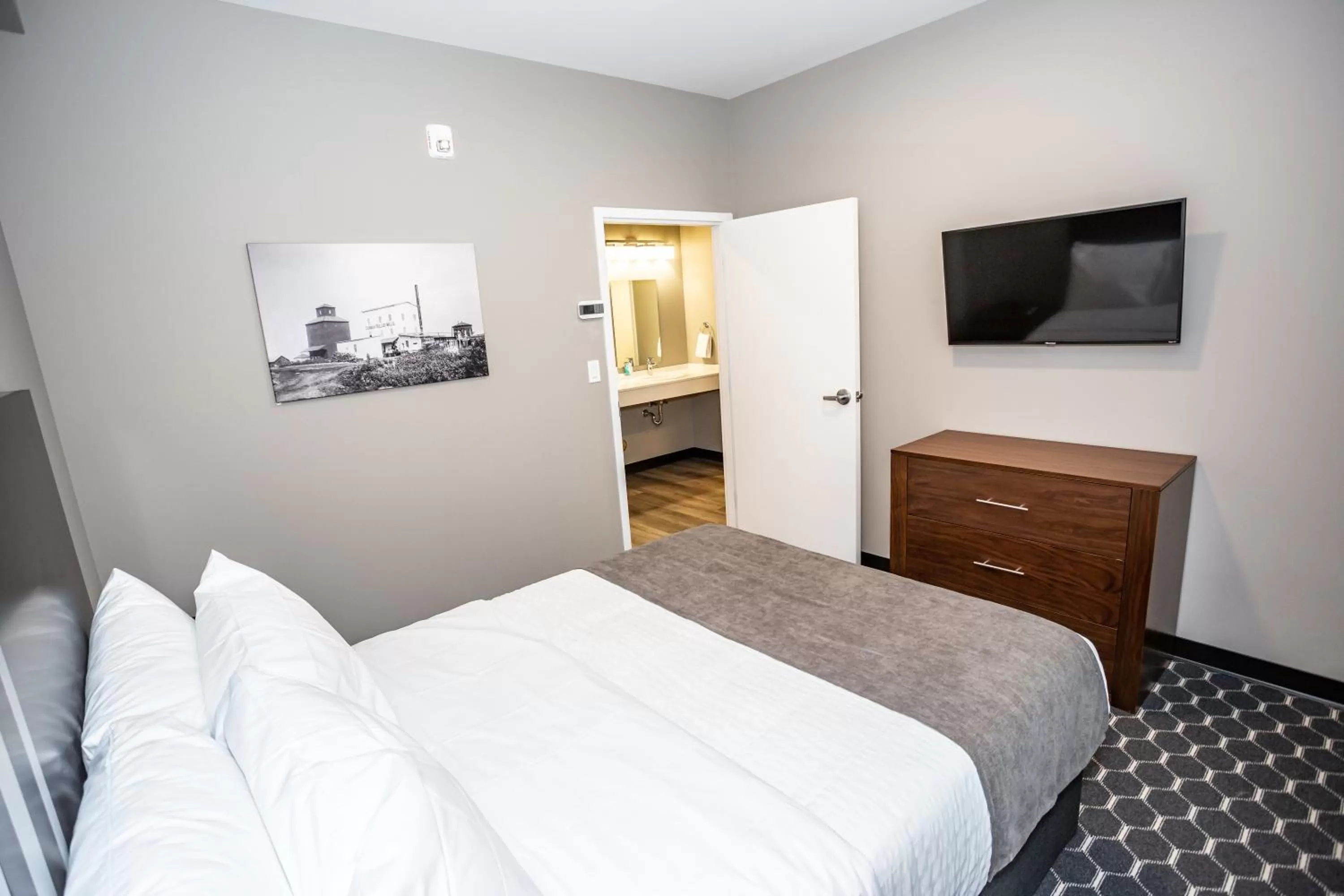 Bed in Carman Blue Crescent Hotel