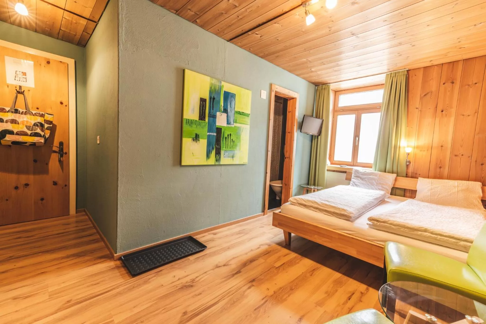 Photo of the whole room in CURUNA Hotel-Garni