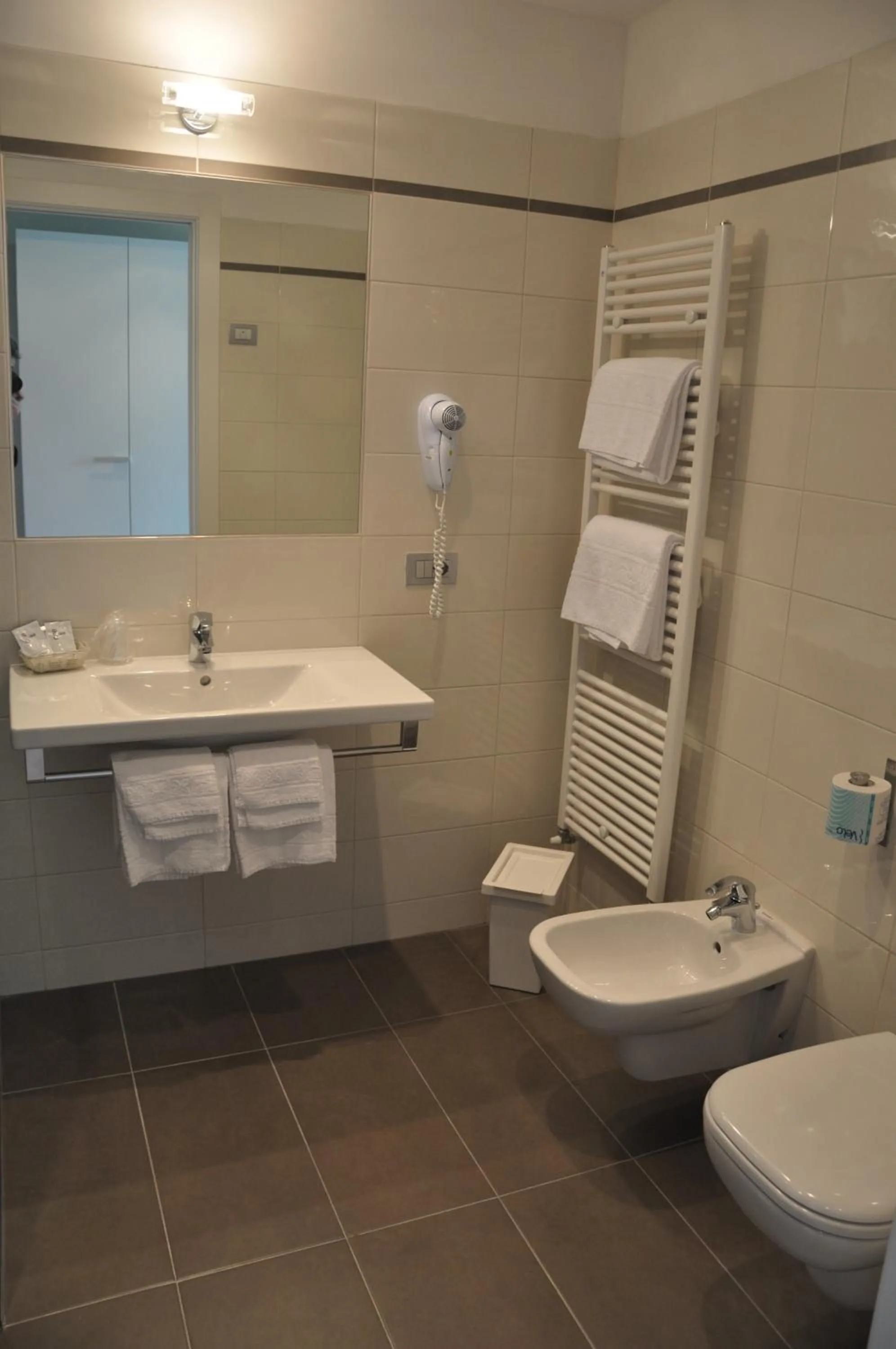 Toilet in Tullio Hotel