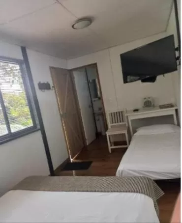 Bed in ALTO LODGING Centro de Entrenamiento Deportivo y Negocios, a 2 pasos del Aeropuerto JMC, Transporte Incluido