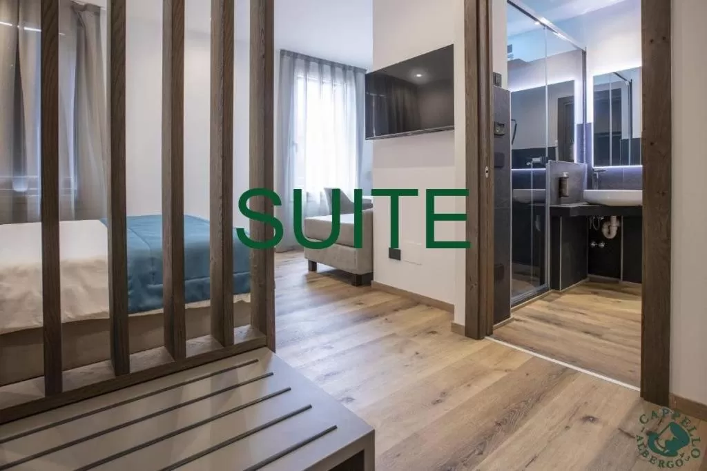 Bed in Albergo Cappello e Cadore