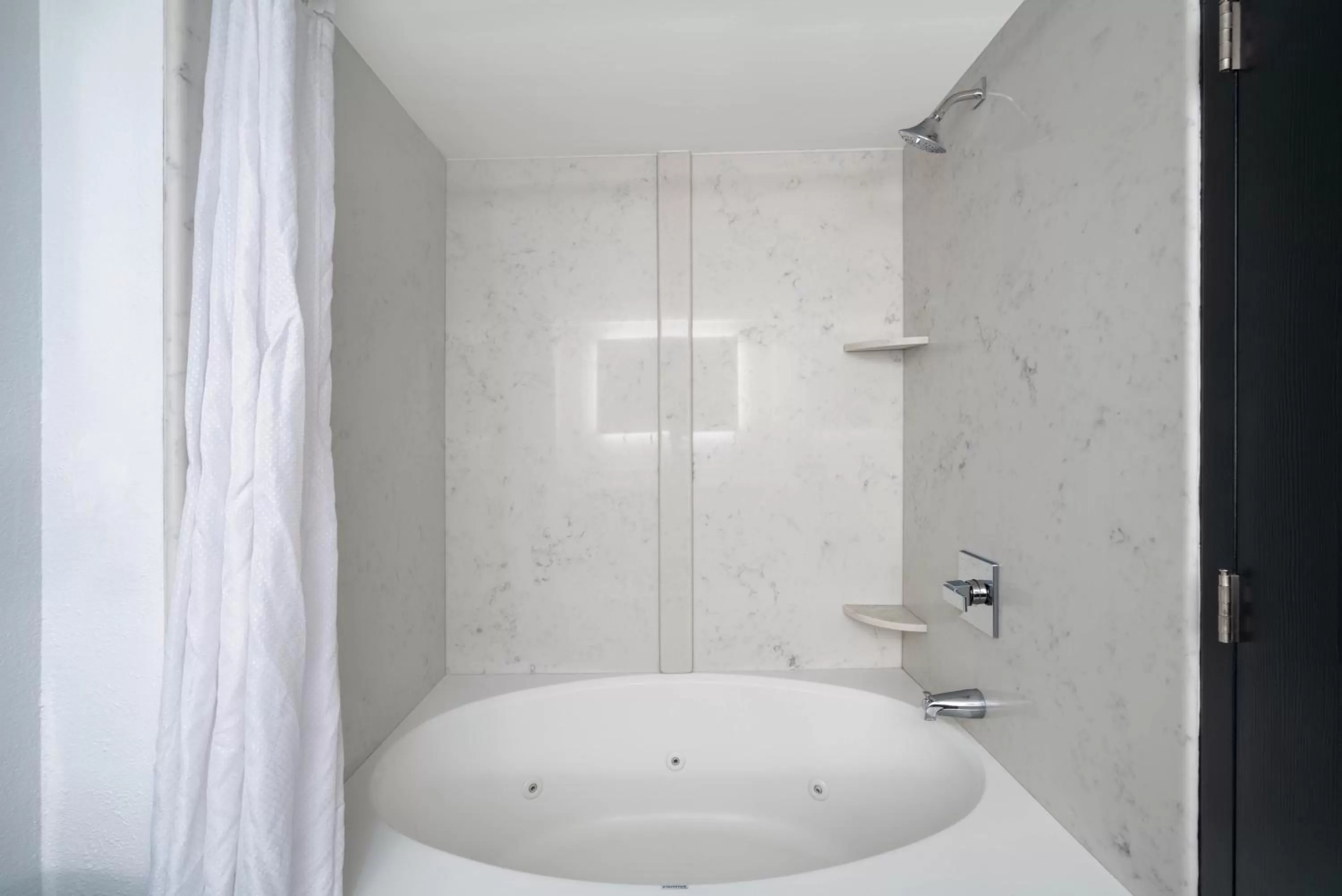 Bathroom in La Quinta by Wyndham Raleigh Downtown North