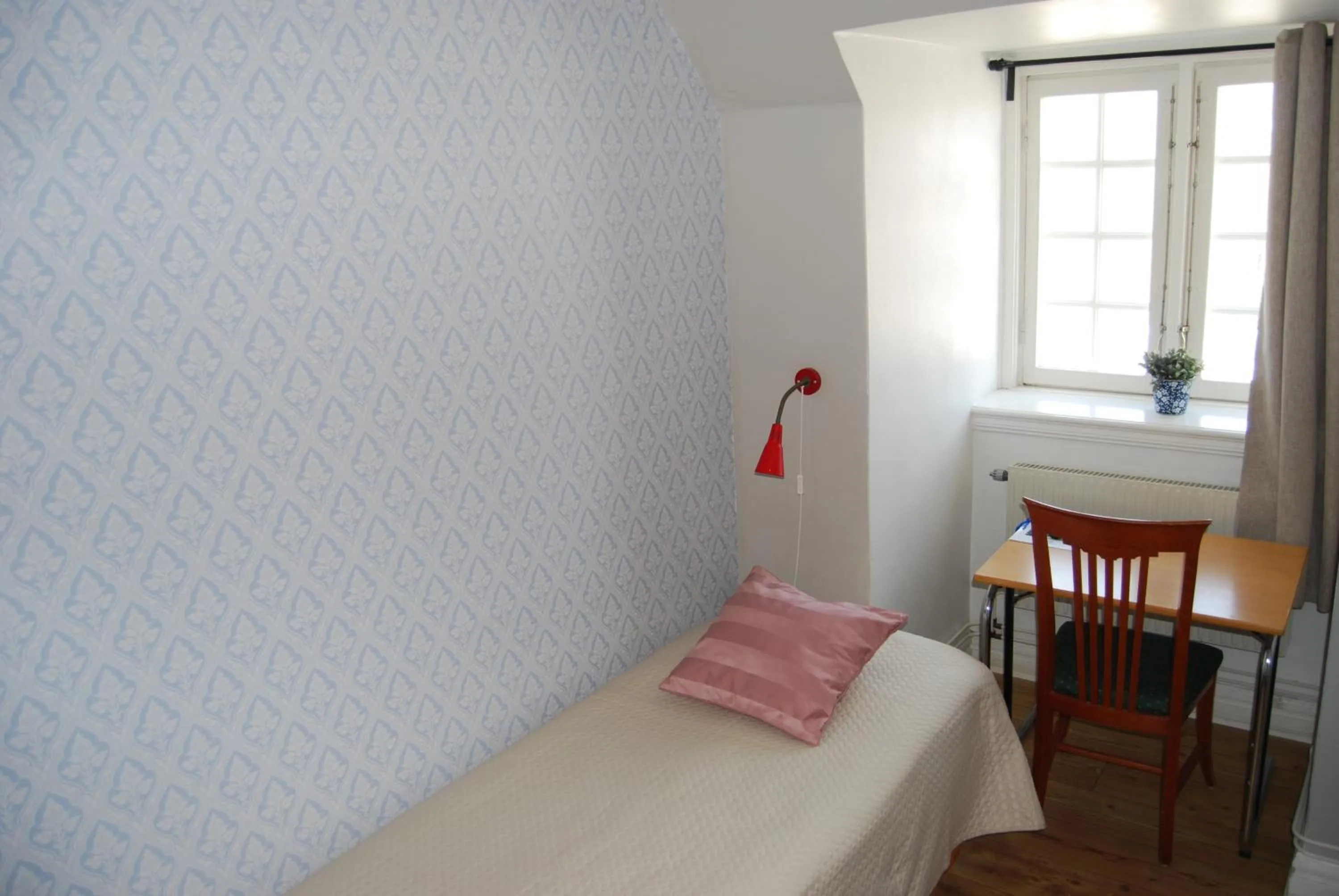 Bed in Halmstad Hotell & Vandrarhem Kaptenshamn