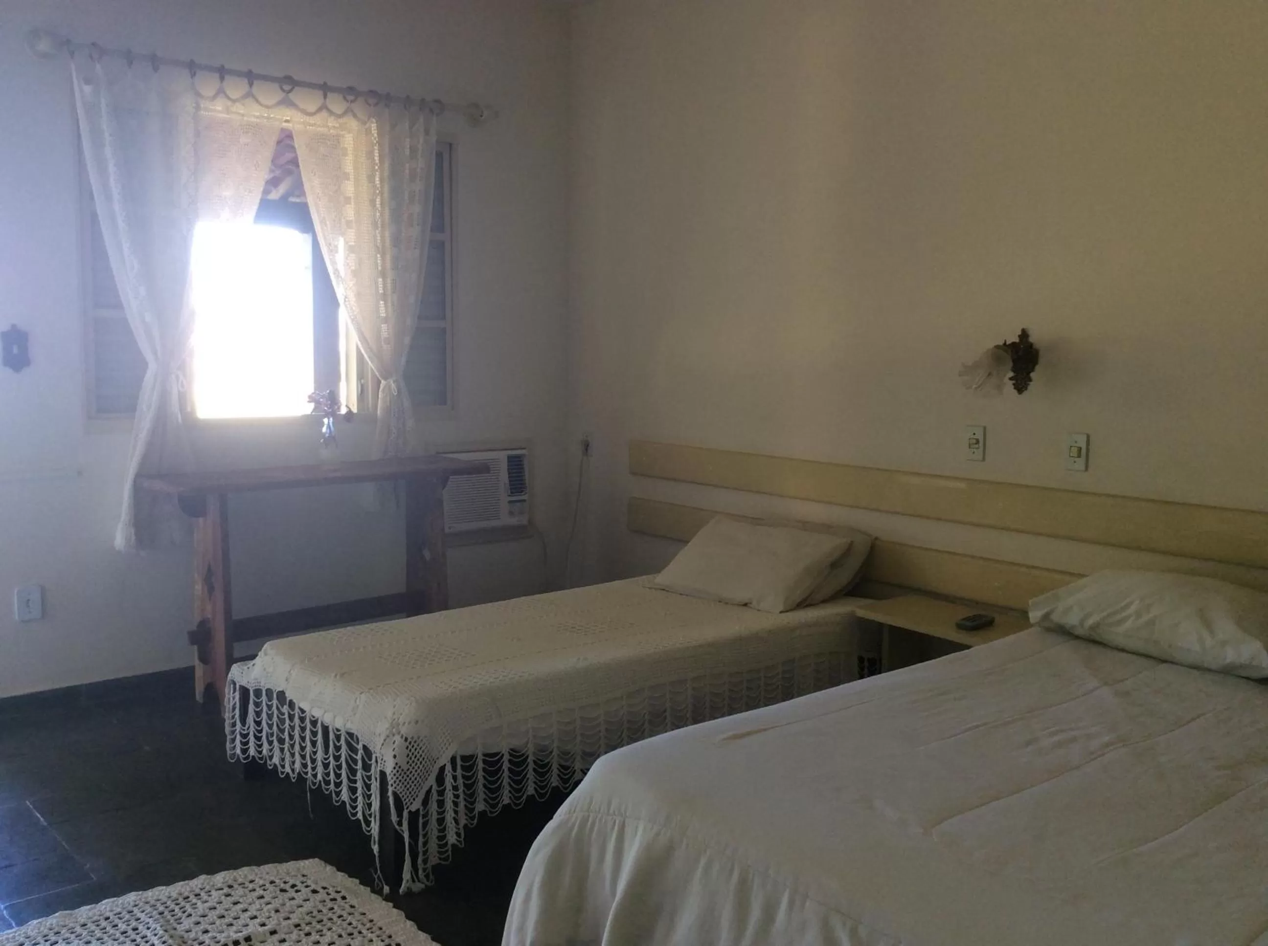 Bed in Pousada Flor da Serra