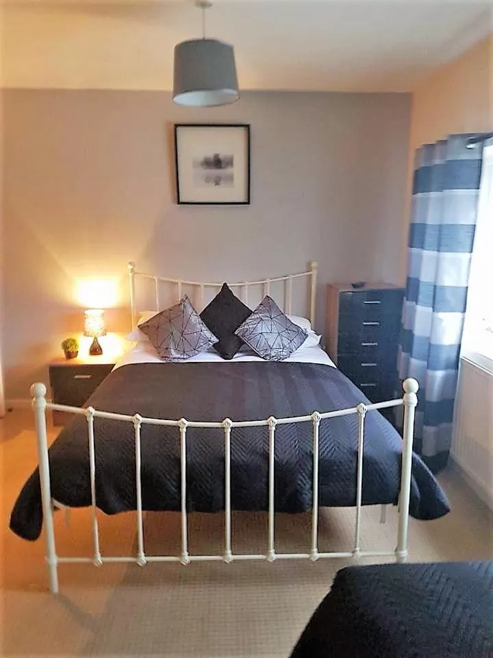 Bed in The Lamb and Flag Inn