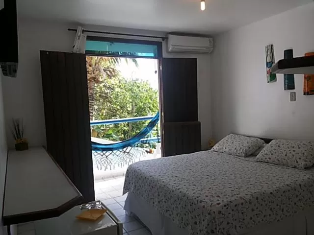 Balcony/Terrace, Bed in Hotel Pousada Estacao Do Sol Natal