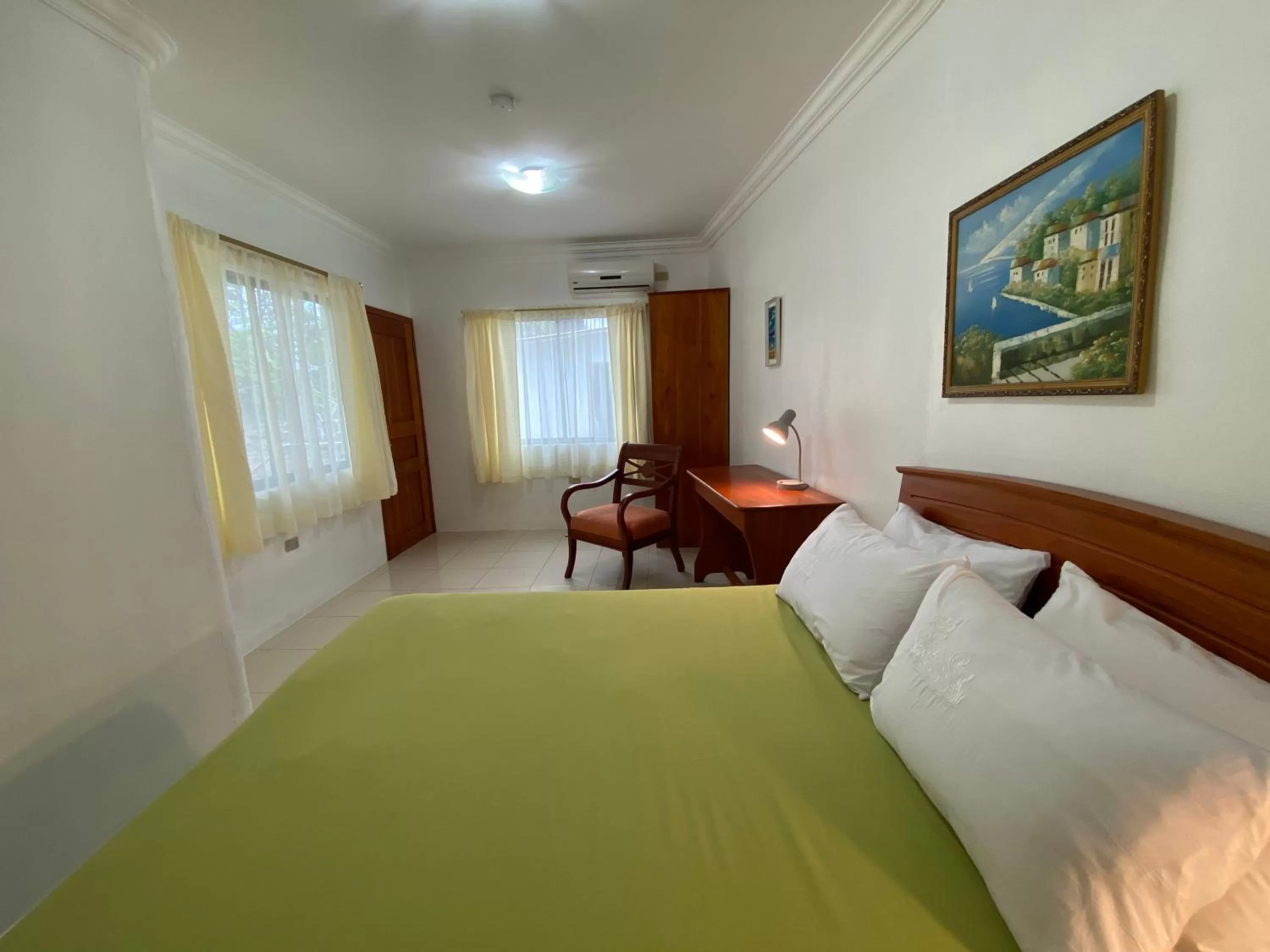 Bed in La Peregrina Galapagos B&B