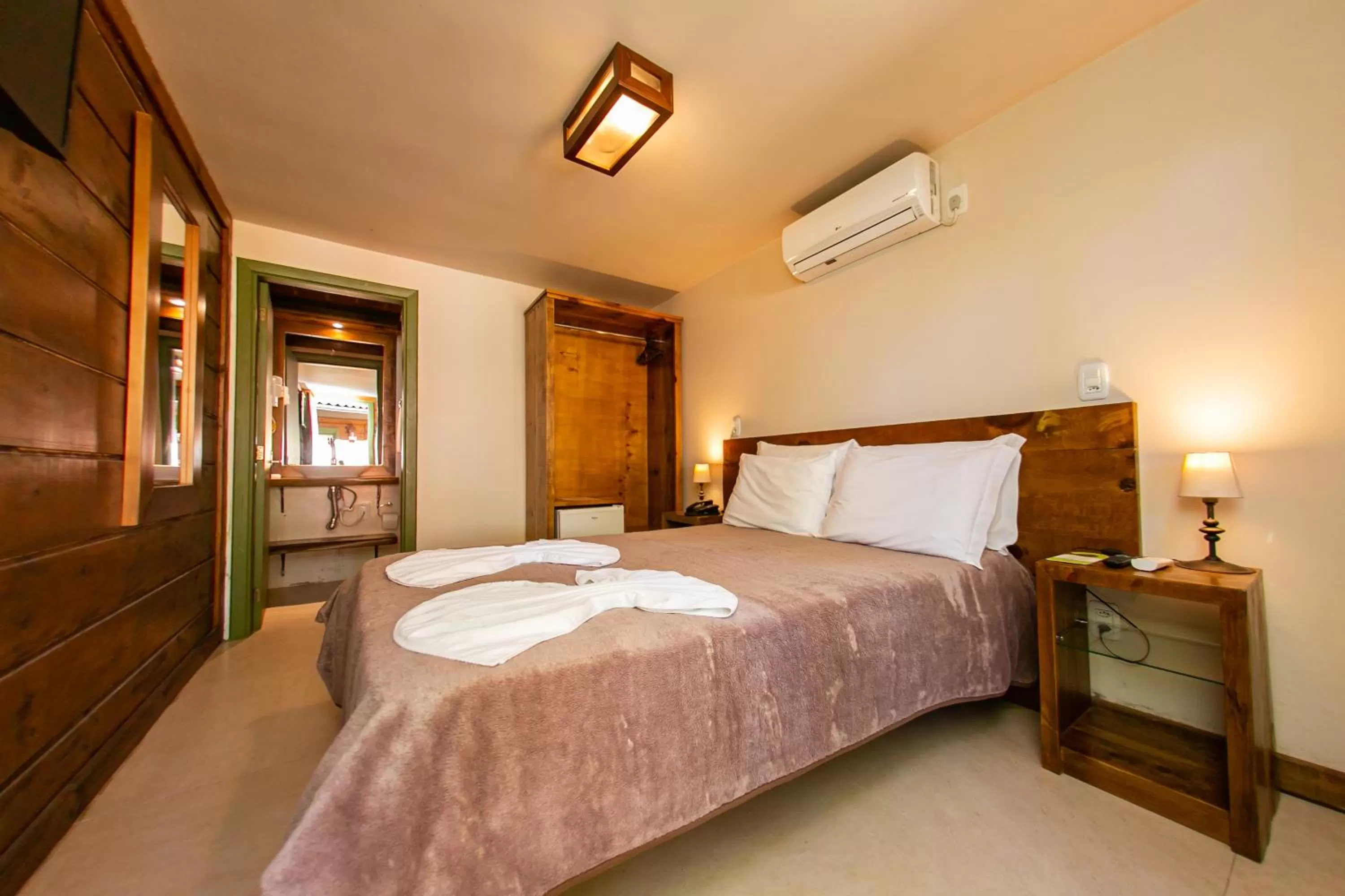 Bed in Pousada Charm Canela