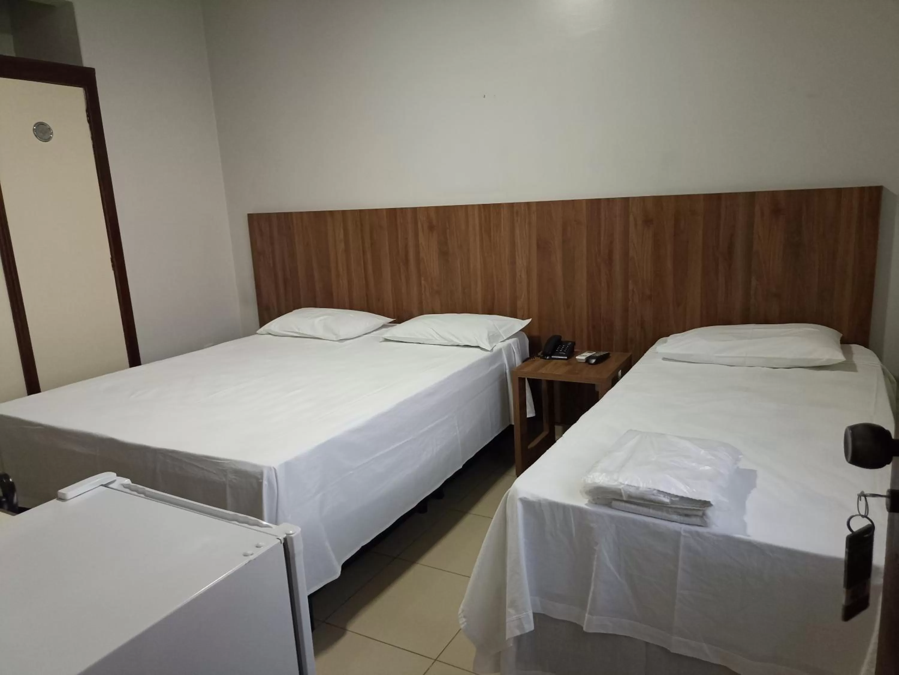 Bed in Hotel Oscar Econômico