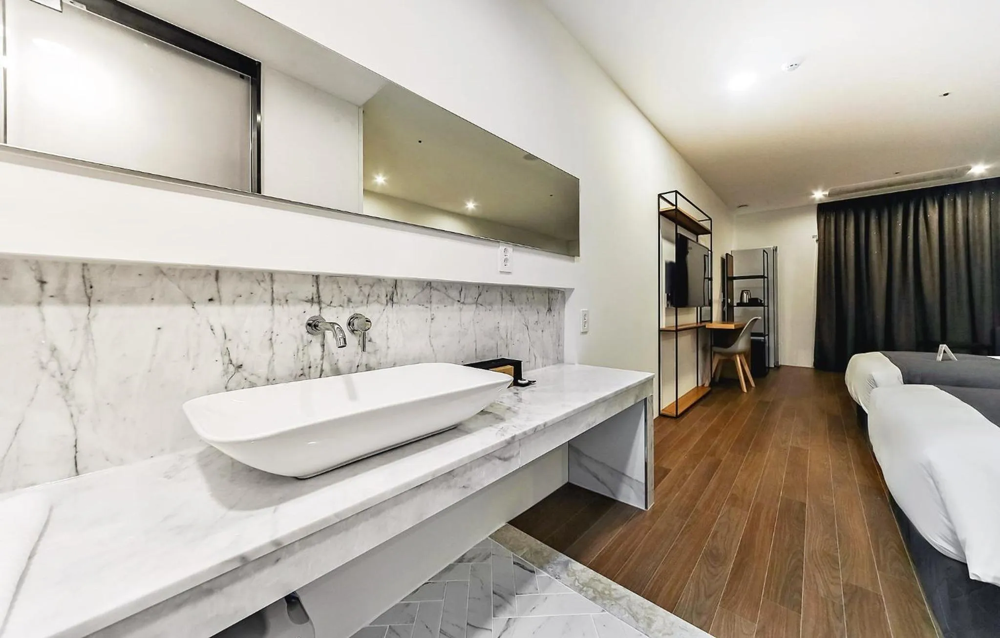 Bed in Hotel Noblestay