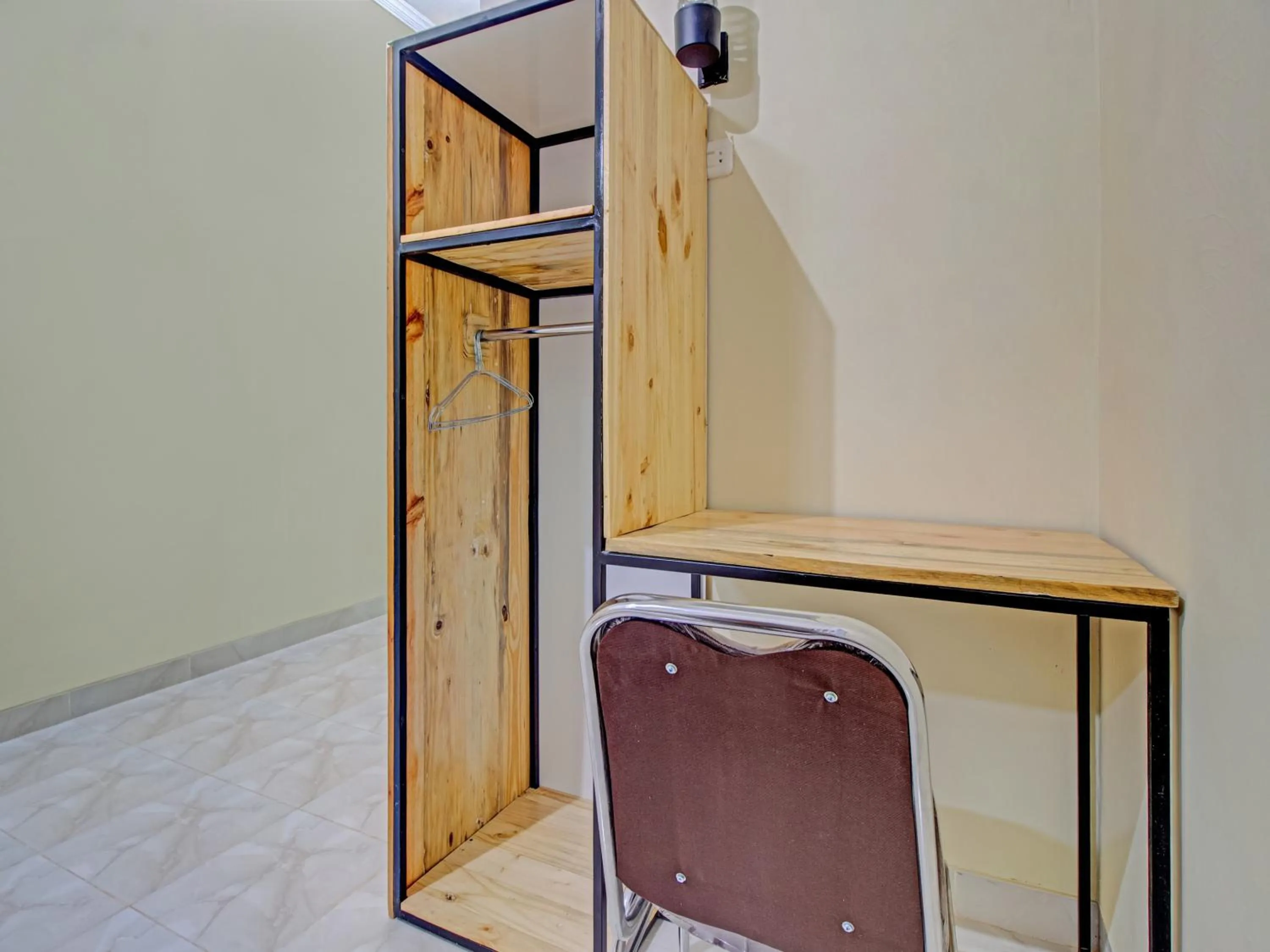 Bedroom in OYO 3774 Orchid 37 Syariah Guest House