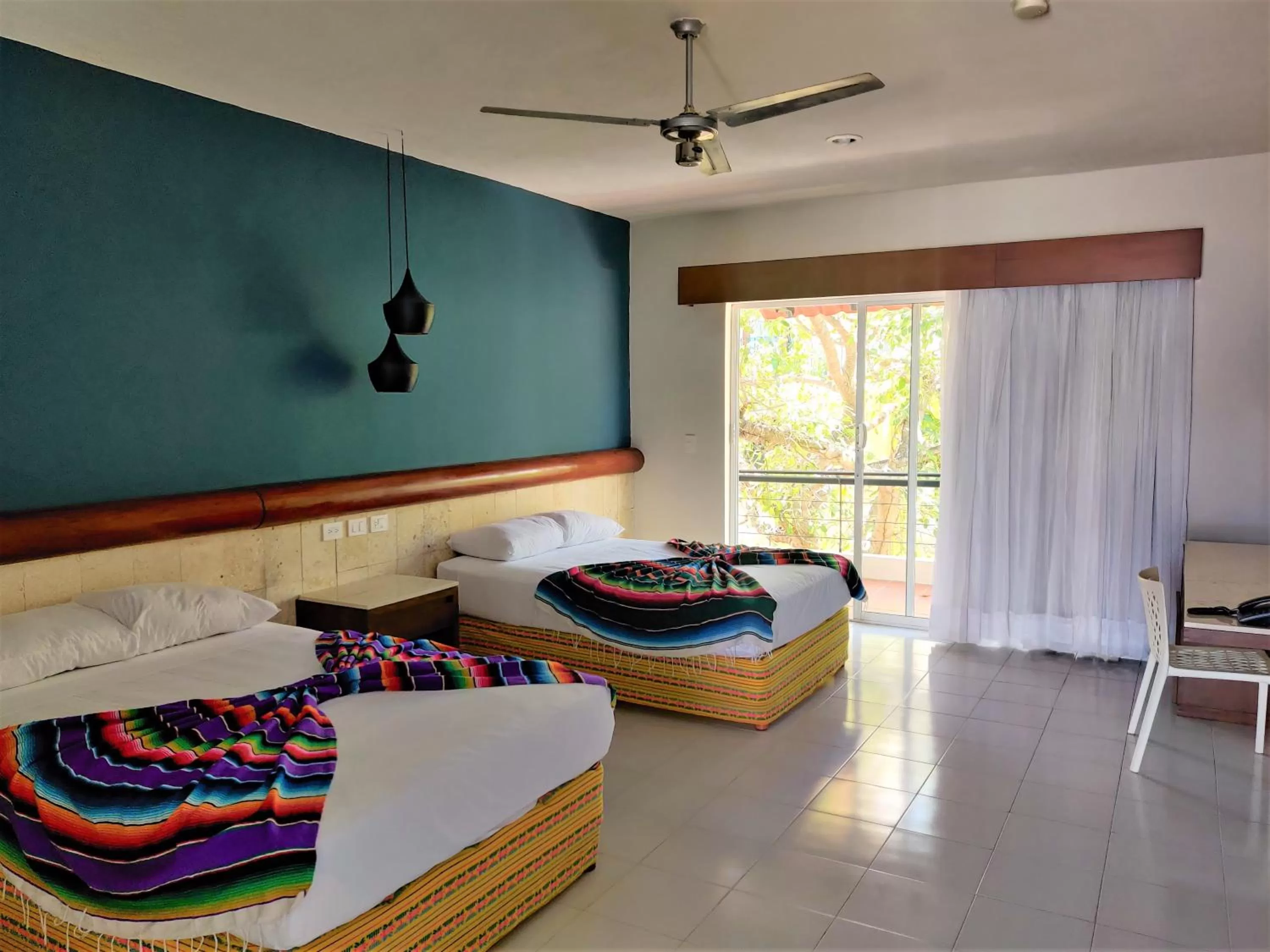 Photo of the whole room, Bed in Hotel Mariachi by Kavia 5th Av